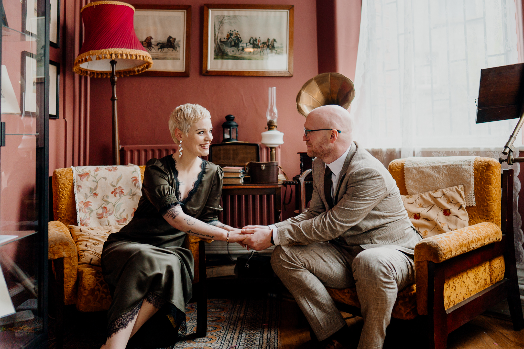 Newly married couple sitting together in the historic Yeats Building in Sligo
