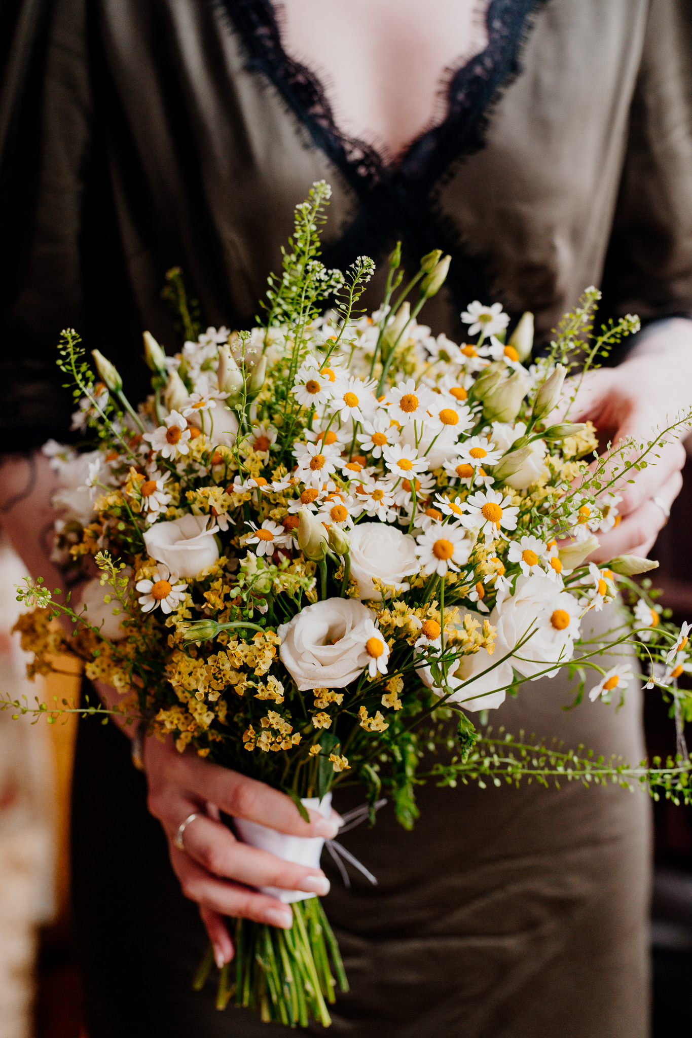 Bride holding her wedding bouquet inside the Yeats Building in Sligo