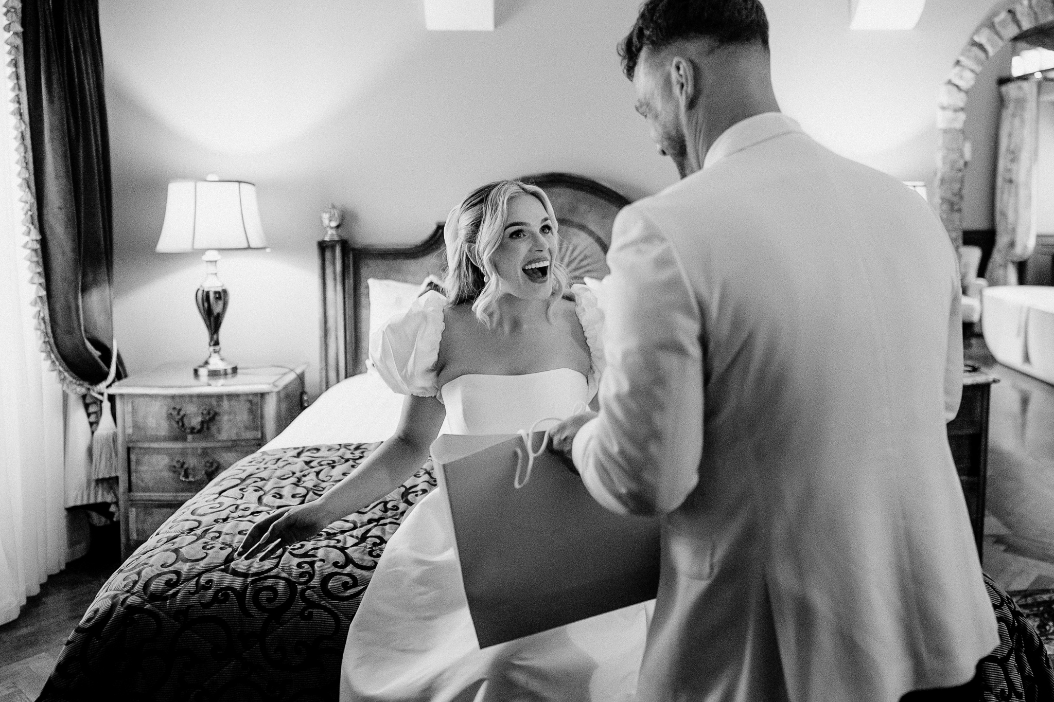 Michael giving Caoimhe a gift in the Bridal Suite at Markree Castle