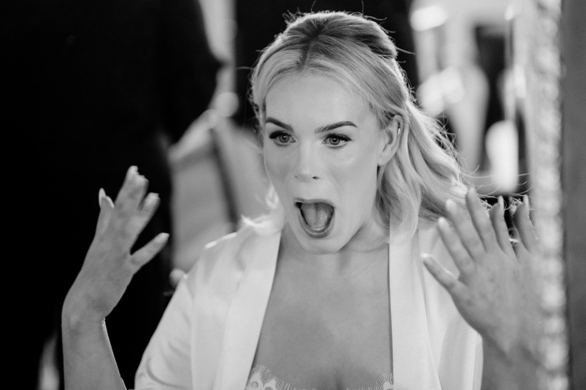 Bride Caoimhe laughing during wedding preparations at Markree Castle