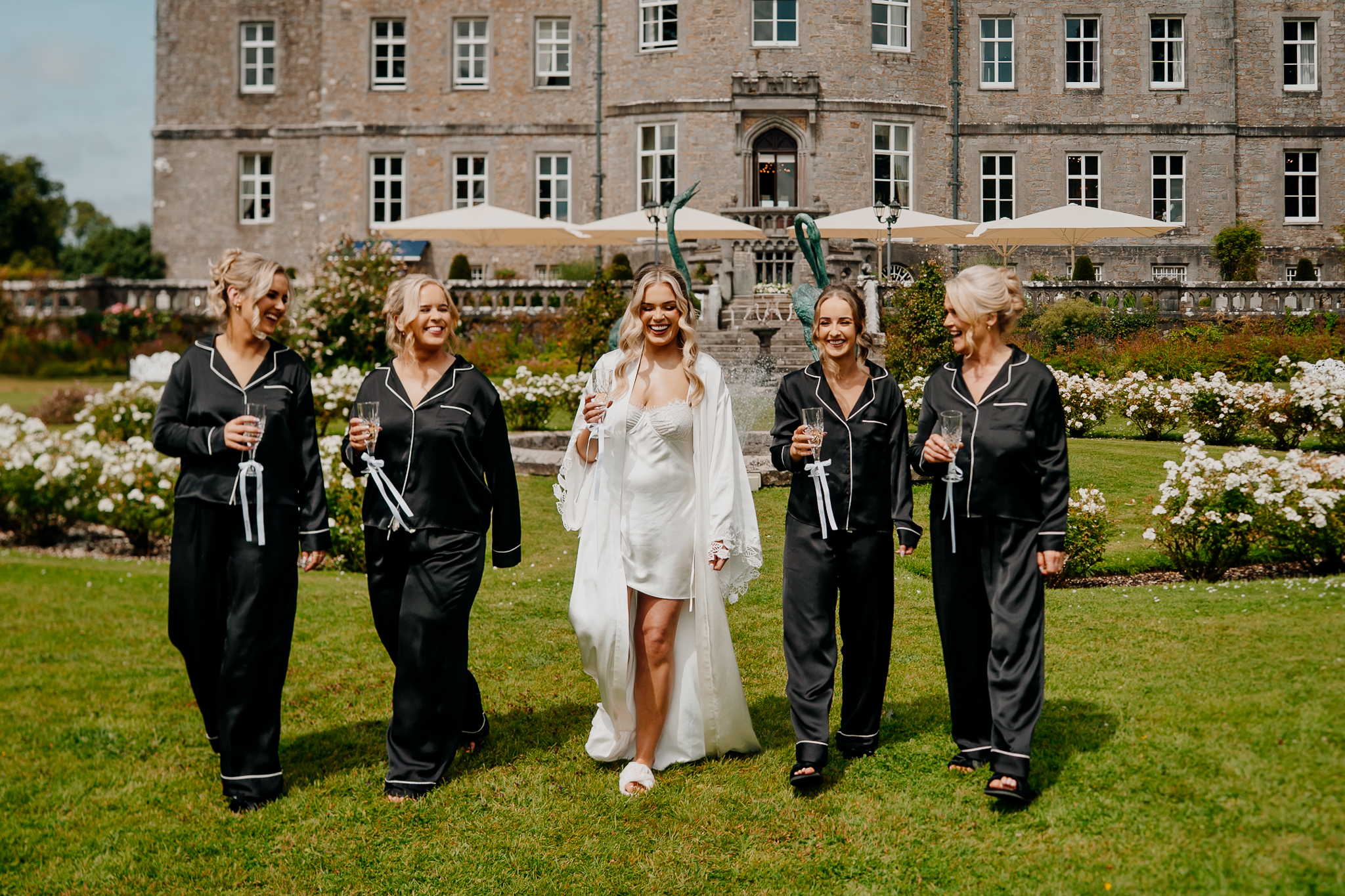 Bride Caoimhe with her bridesmaids outside Markree Castle in Sligo