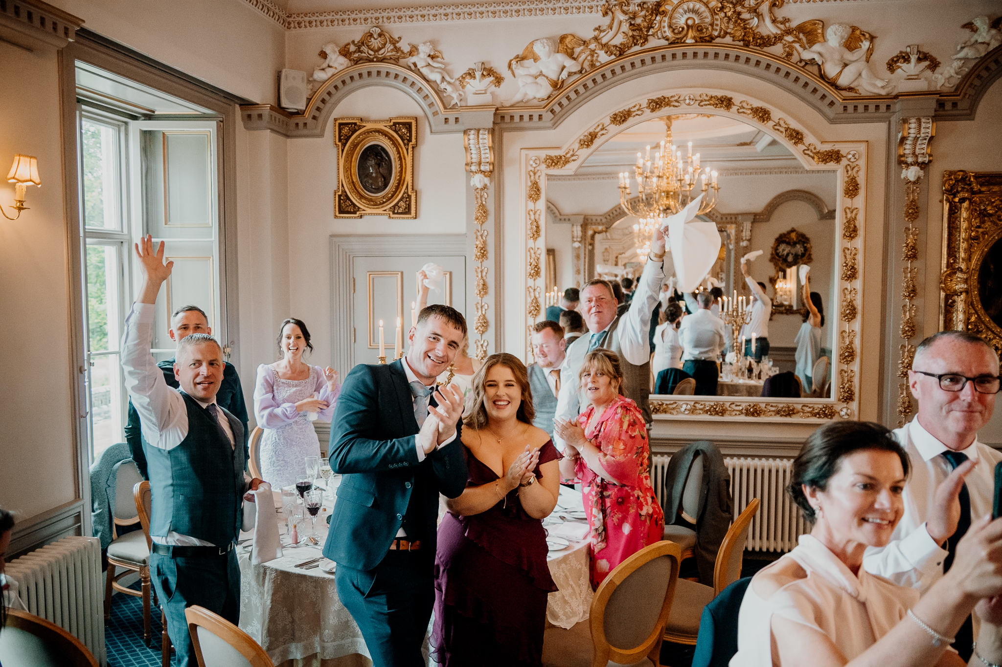 Caoimhe and Michael welcomed by guests in the Dining Room at Markree Castle