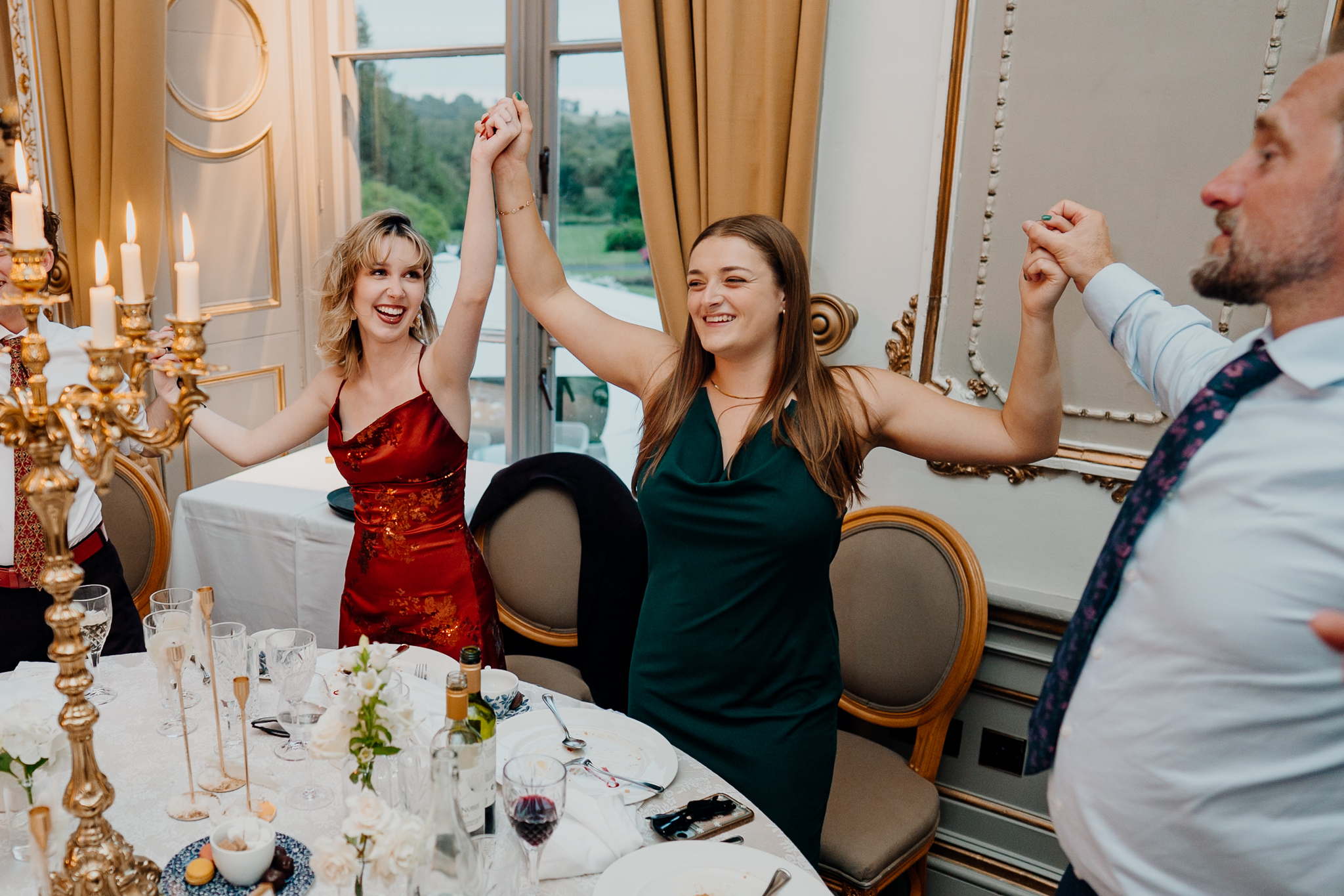 Wedding guests dancing during surprise entertainment in the Markree Castle Dining Room