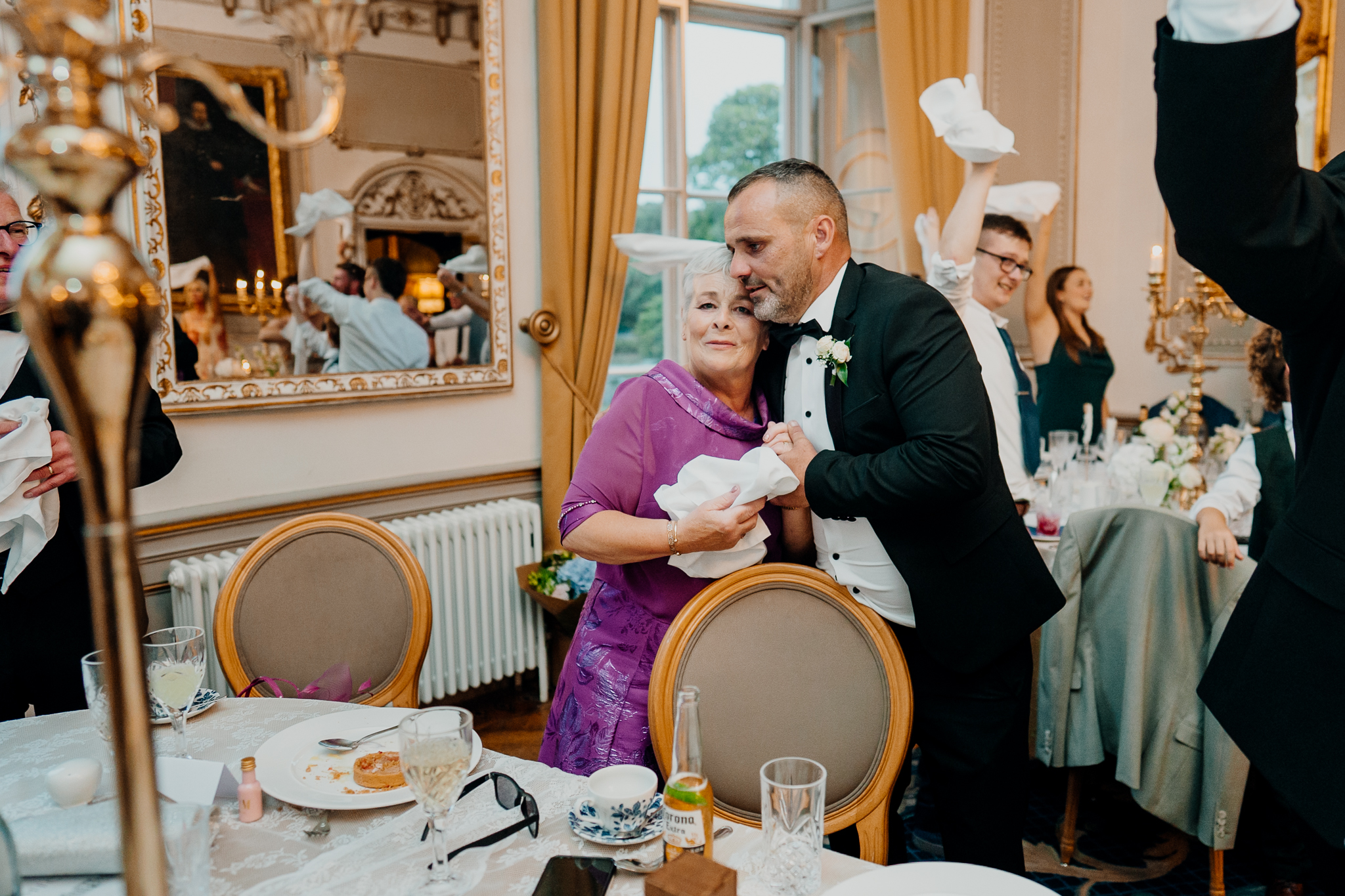 Wedding guests waving napkins during the reception at Markree Castle
