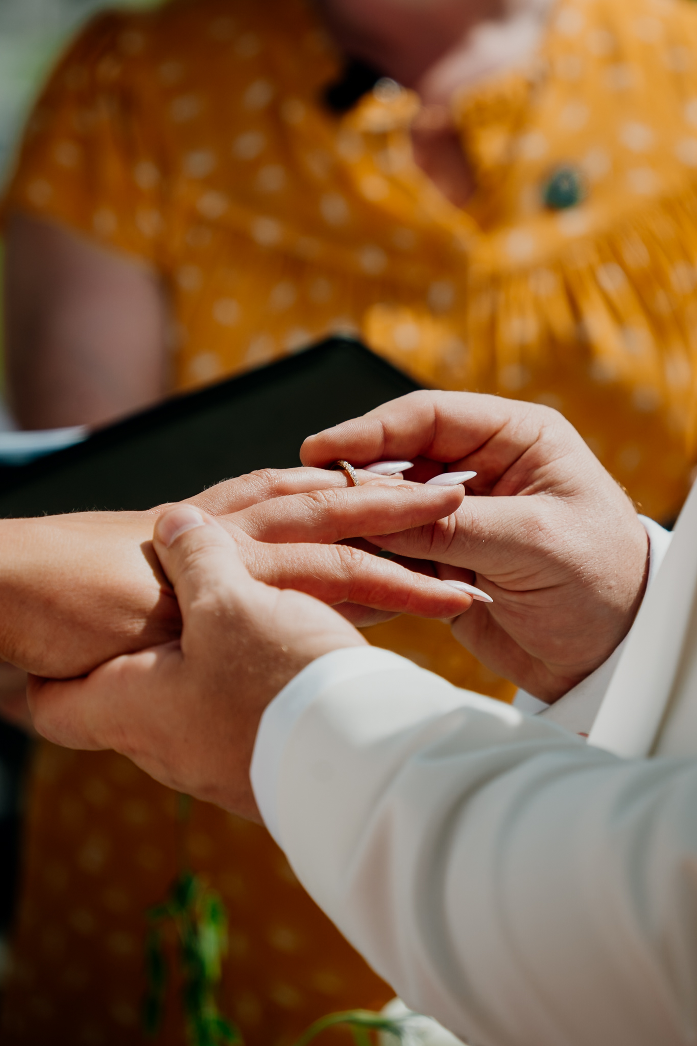 Wedding ring being placed on the bride’s finger during a Markree Castle ceremony
