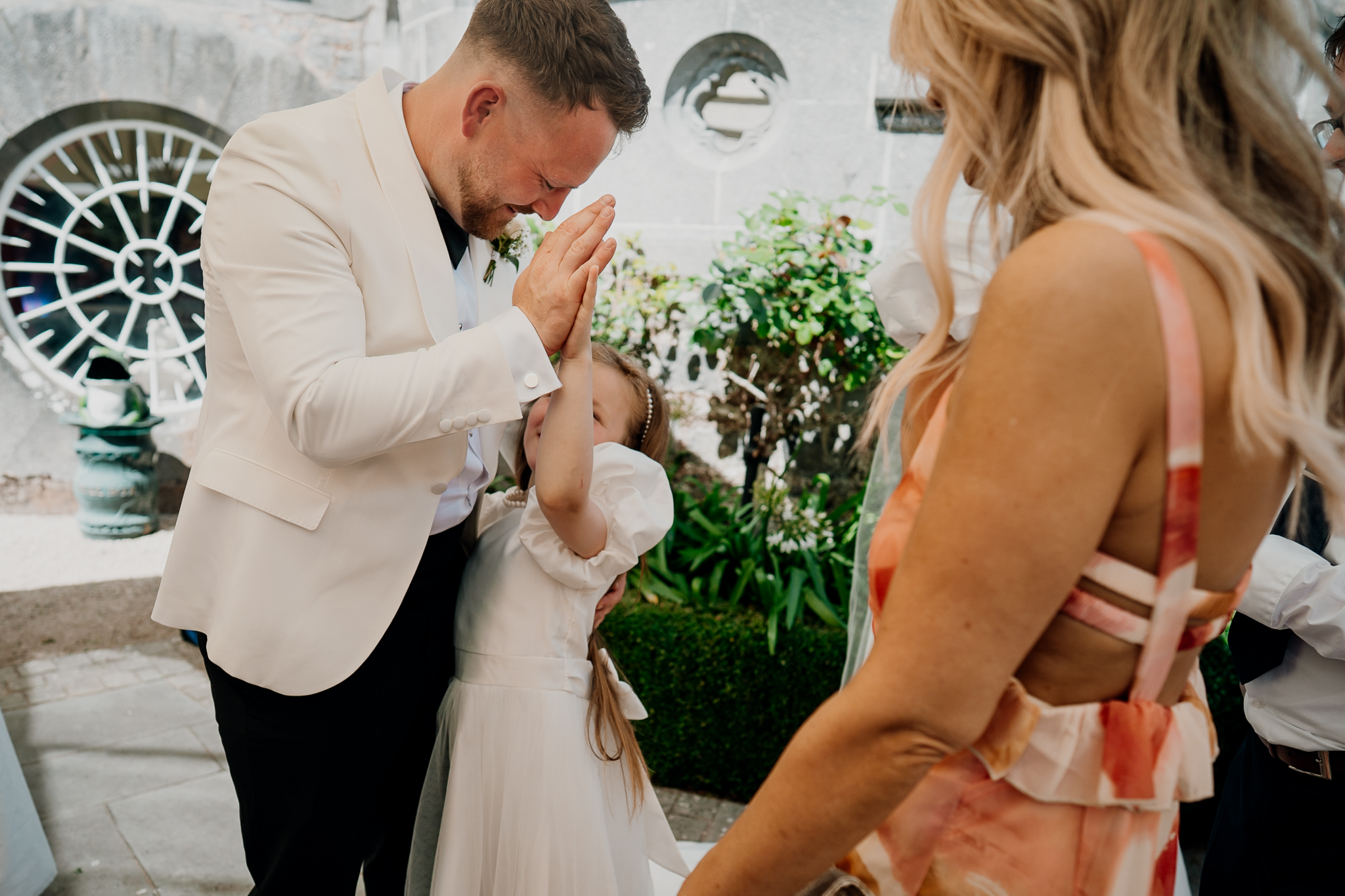 Groom Michael during an emotional moment at his Markree Castle wedding ceremony