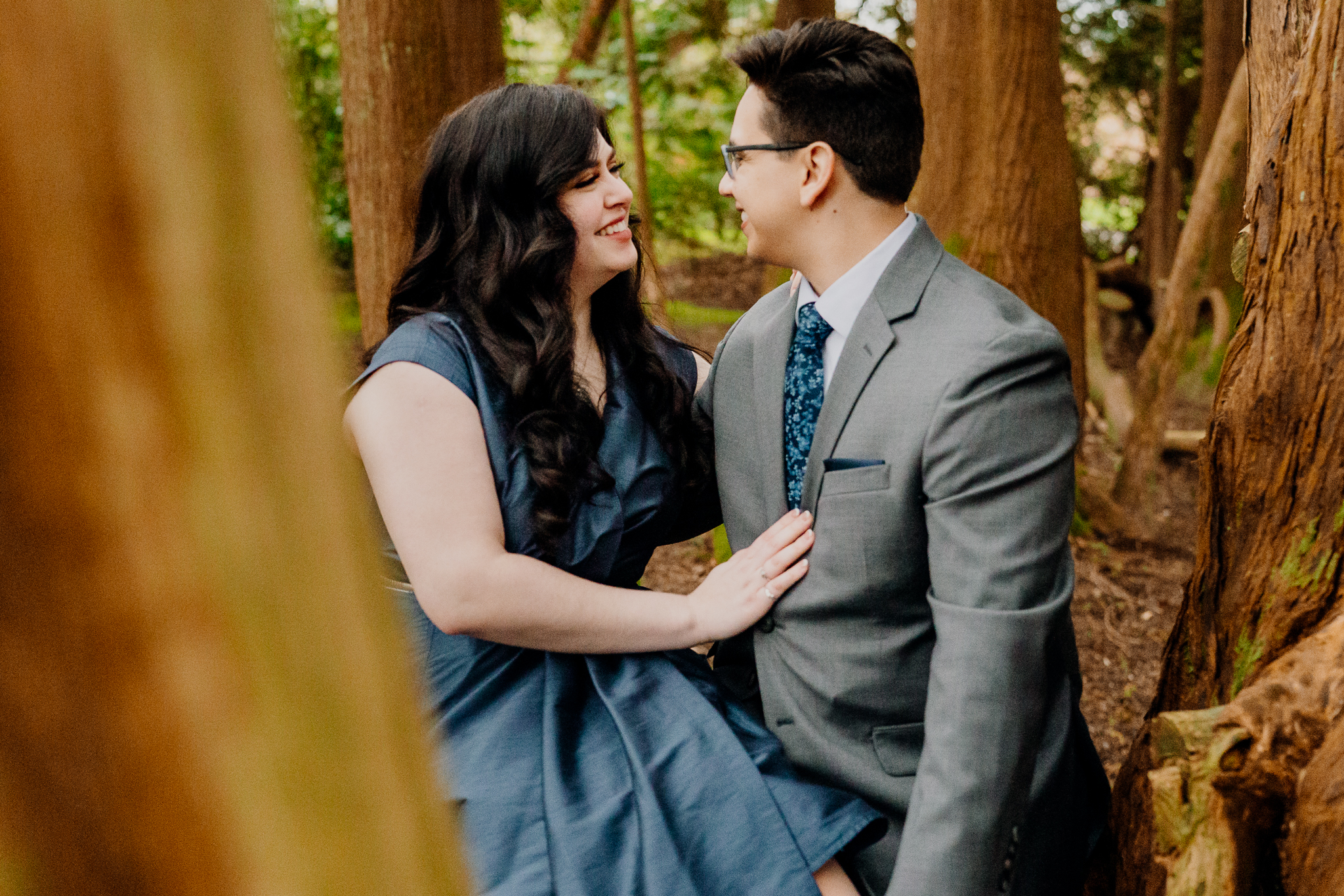 Newly engaged couple smiling at each other during their Markree Castle engagement photography session in Sligo, Ireland.