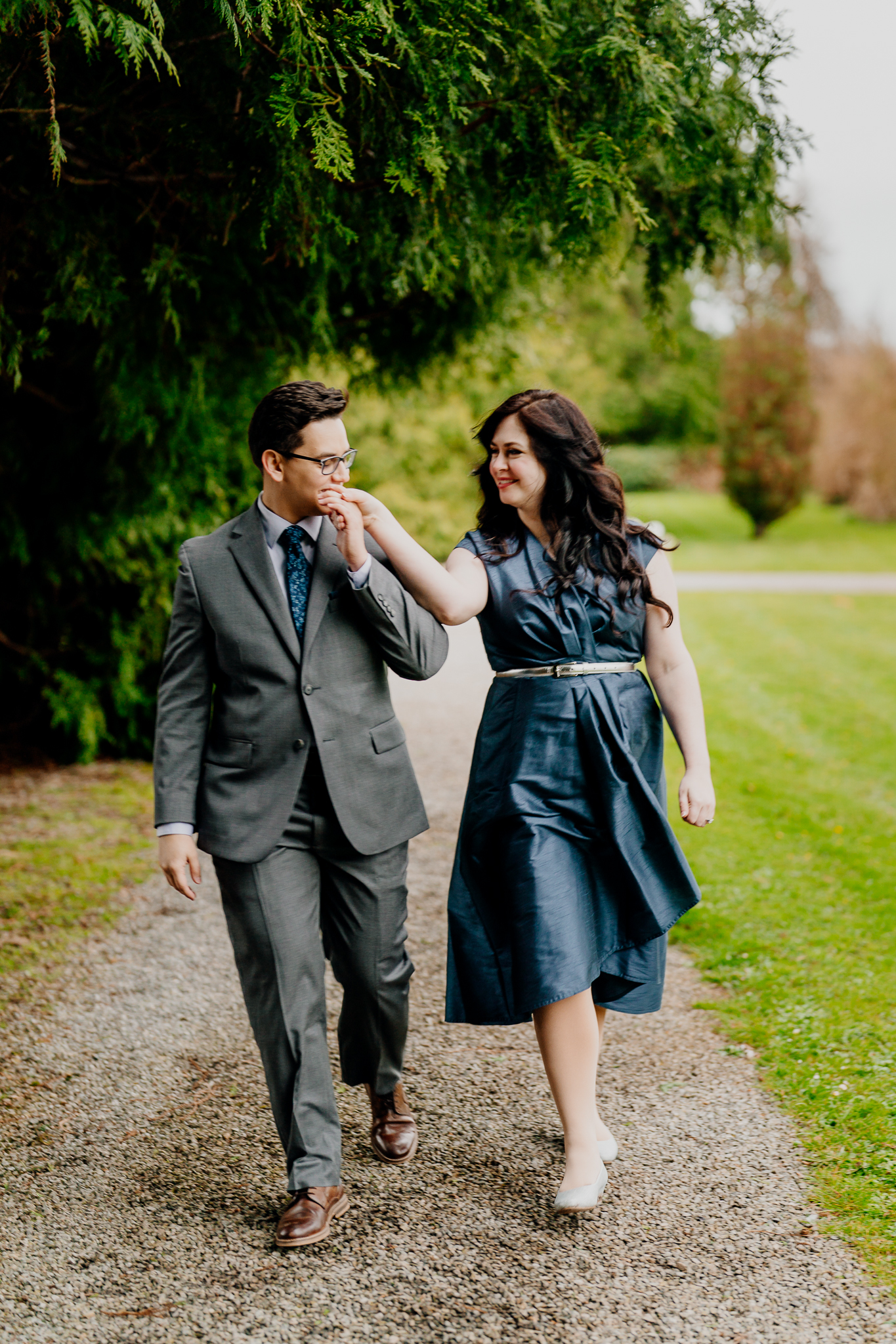 Newly engaged couple sharing a playful moment during their woodland engagement session at Markree Castle in Sligo, Ireland.