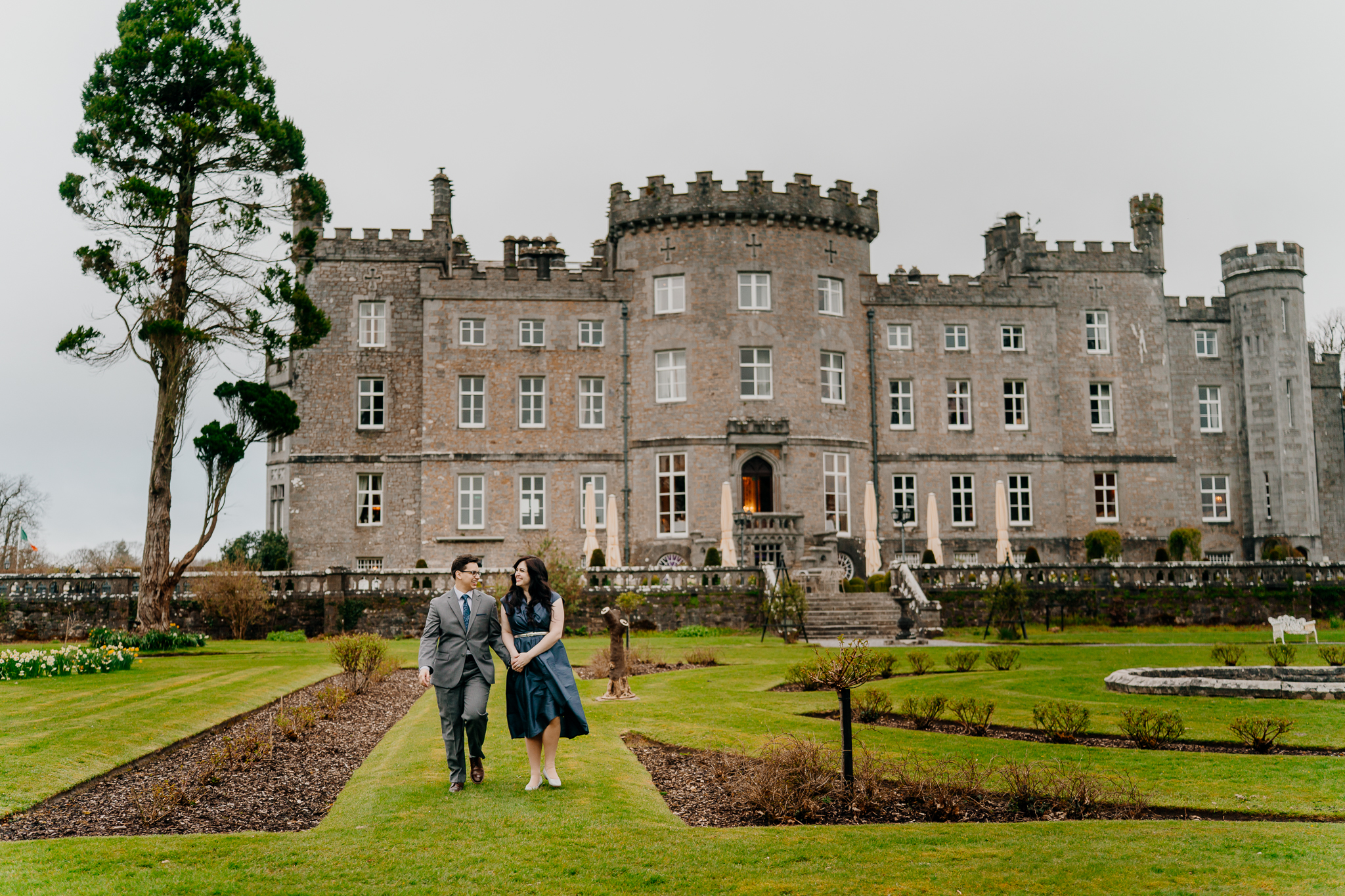 Newly engaged couple photographed in front of Markree Castle in County Sligo, Ireland, following their surprise marriage proposal.