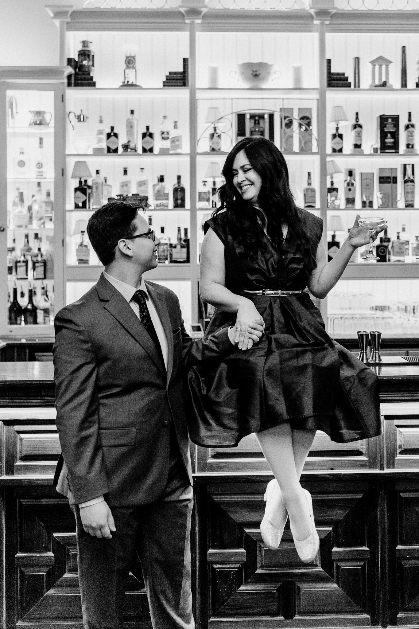 Newly engaged couple celebrating their surprise proposal together at the bar inside Markree Castle in Sligo, Ireland.