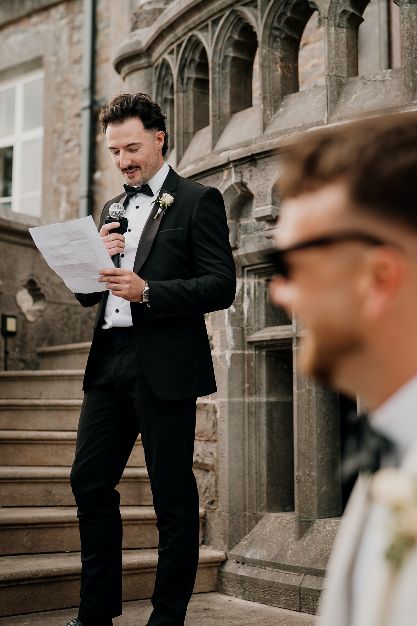 Groomsman giving a wedding speech on the terrace at Markree Castle