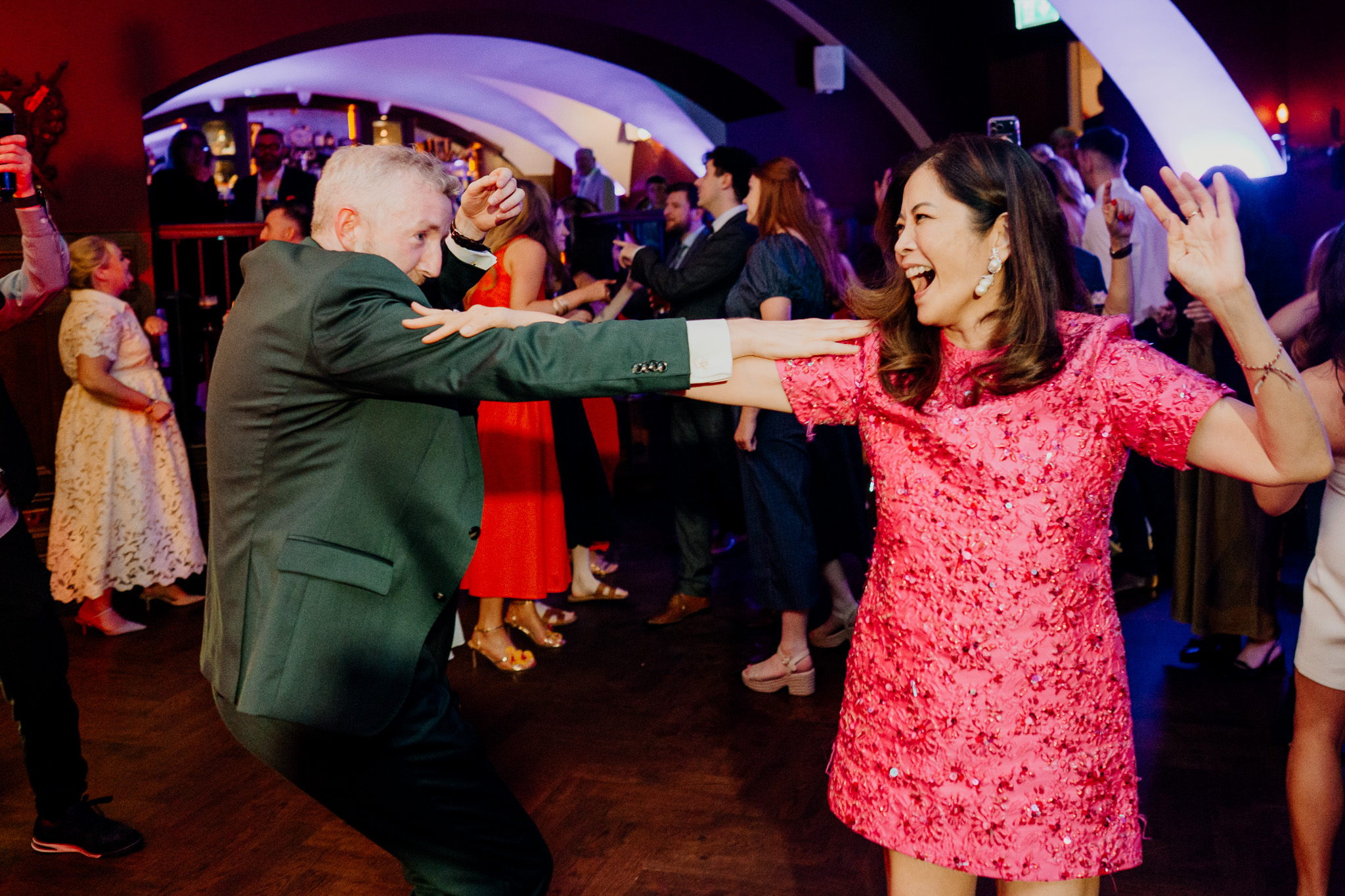 Wedding guests celebrating on the dance floor at Markree Castle