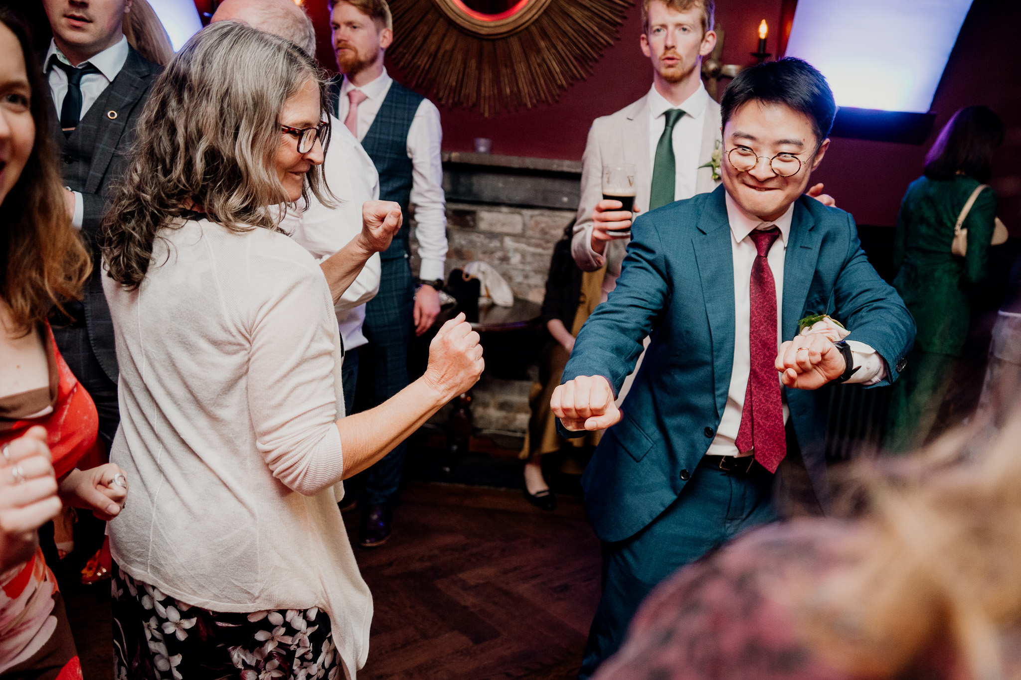 Wedding guests laughing on the dance floor at Markree Castle