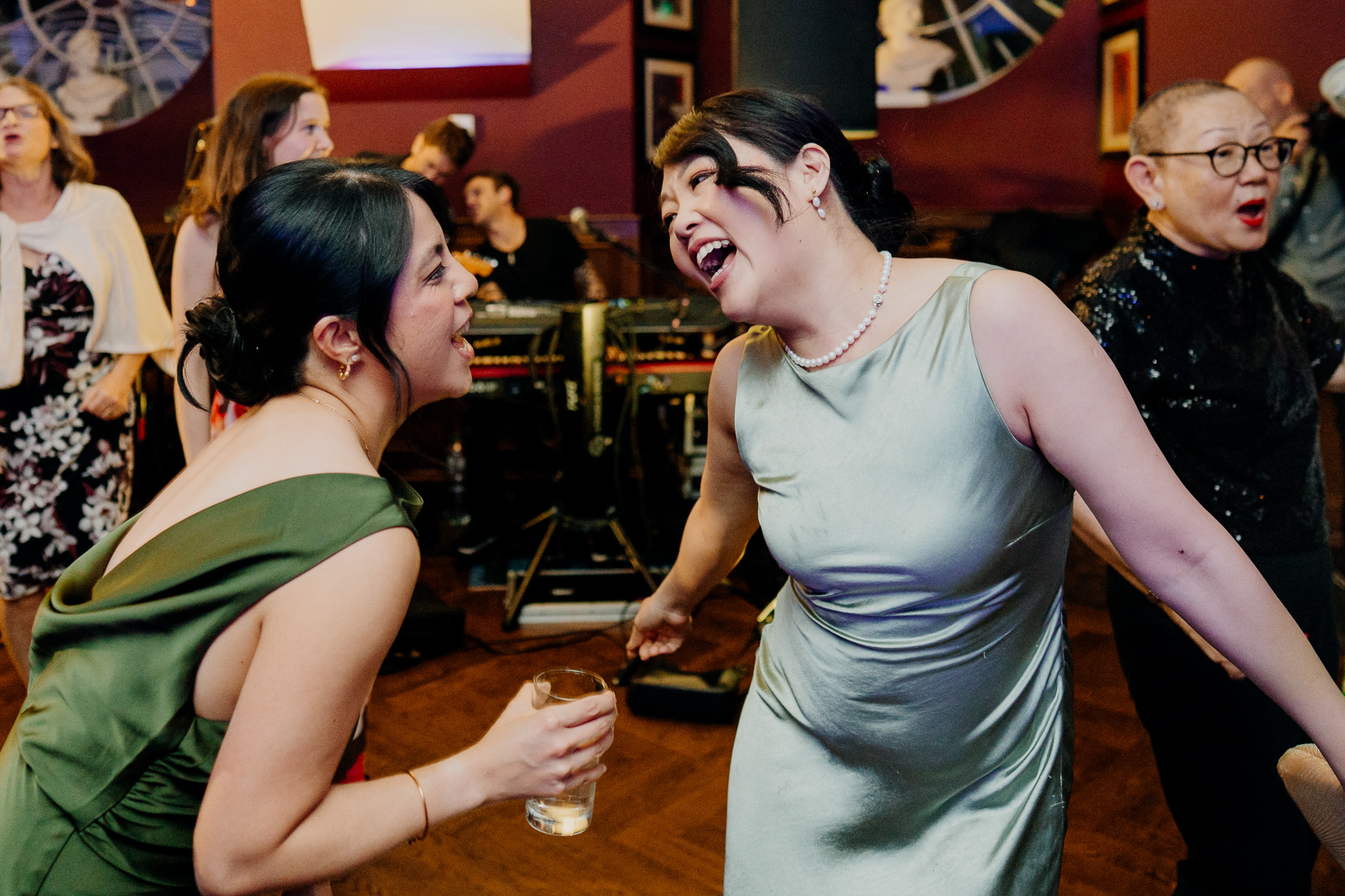 Wedding guests laughing and dancing at Markree Castle