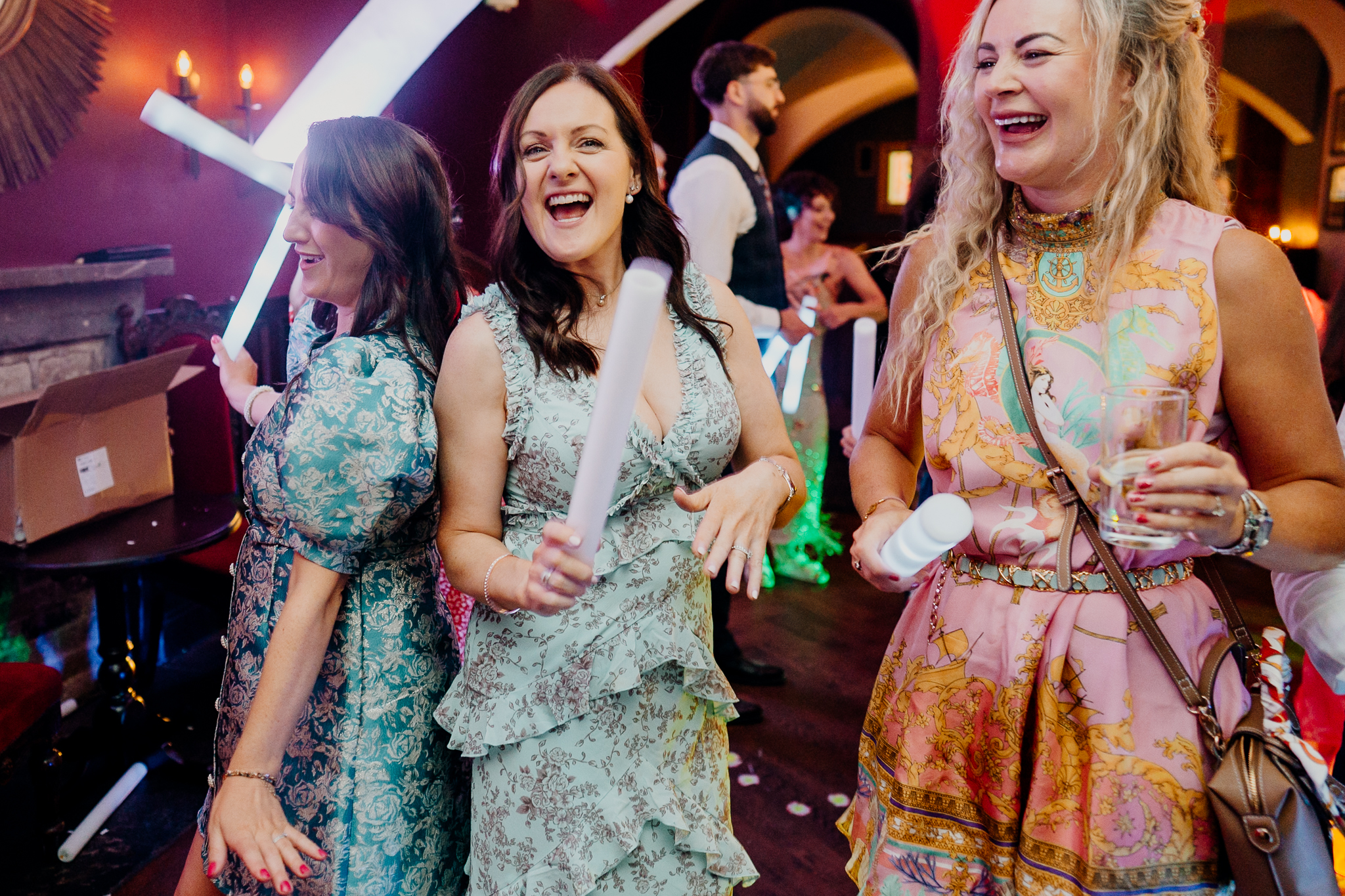 Wedding guests laughing together on the dance floor at Markree Castle