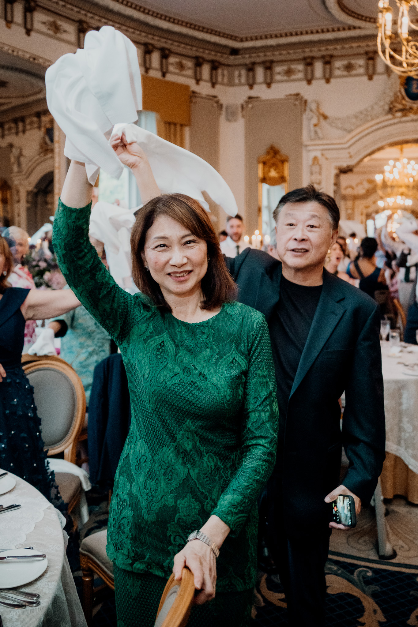 Wedding guests cheering during the reception at Markree Castle