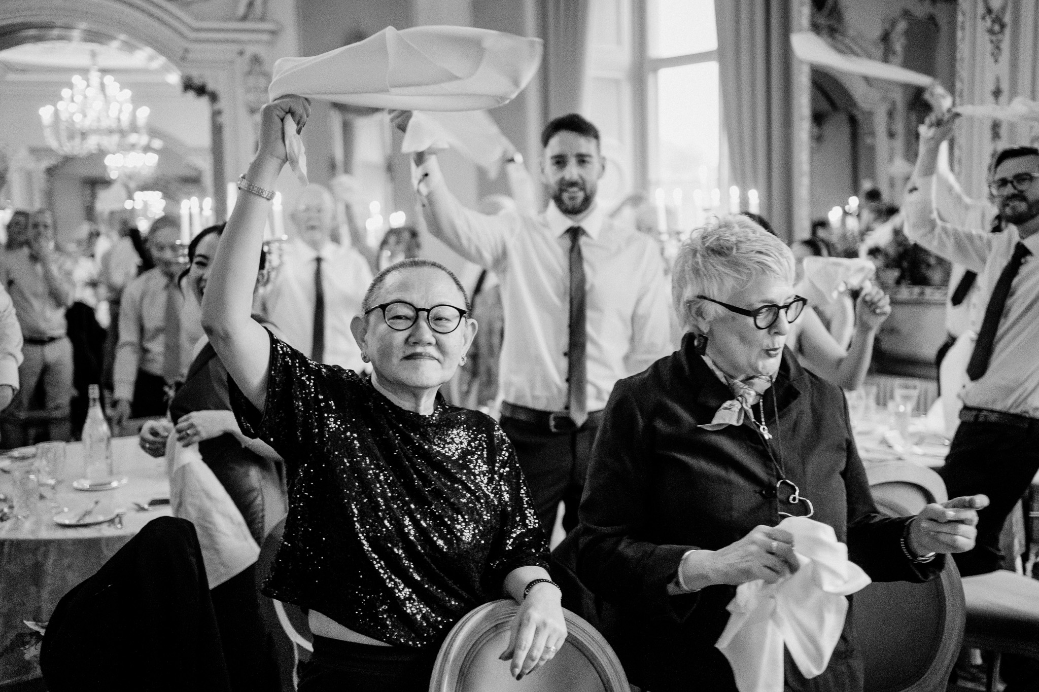Wedding guests cheering during the reception in Markree Castle Dining Room