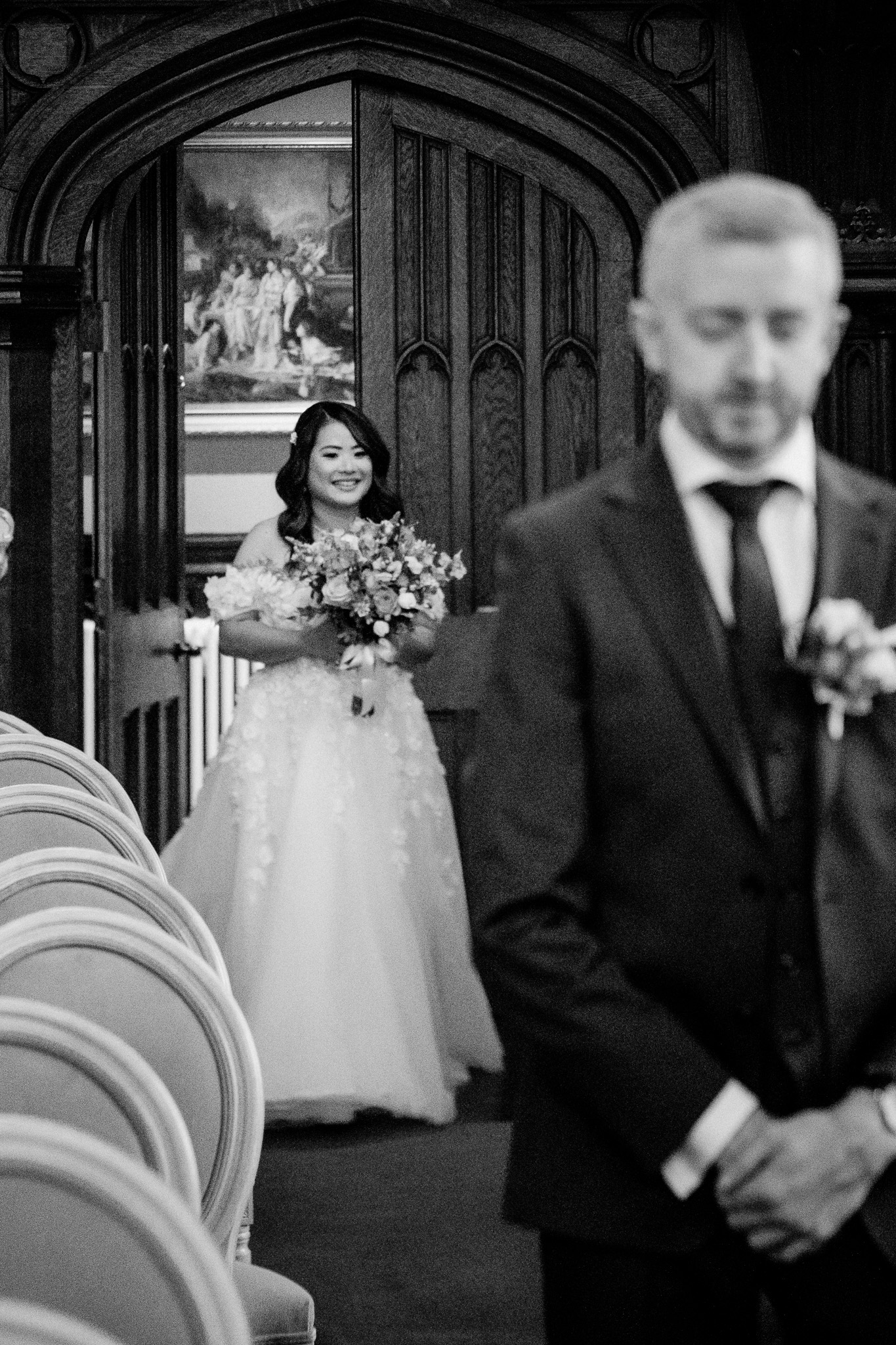 Bride approaching groom for a first look in Markree Castle Chapel