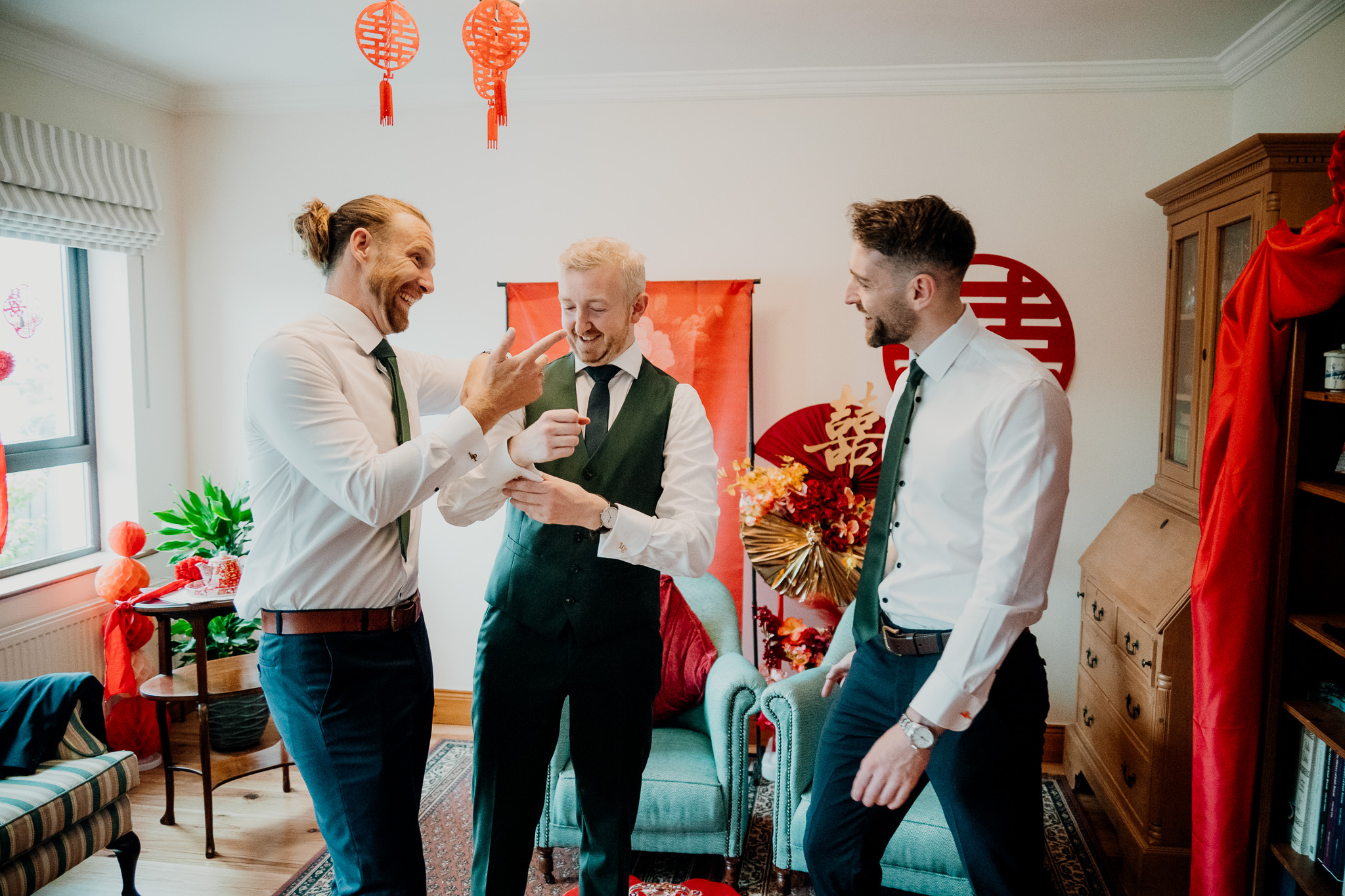 Groom and groomsmen getting ready on the wedding morning