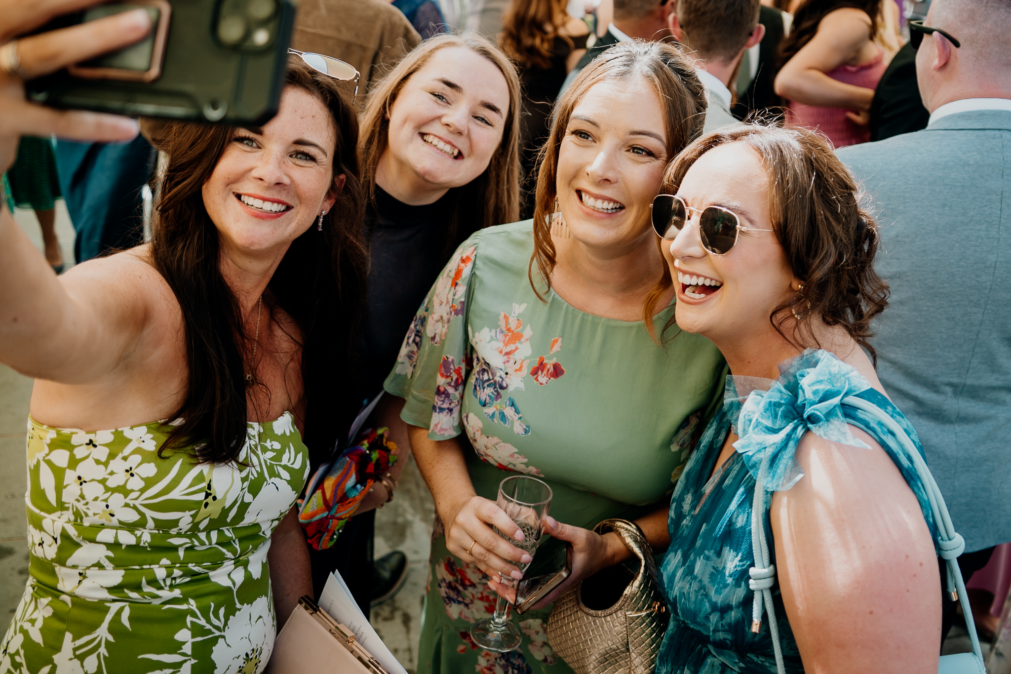Wedding guests laughing together during the reception at Markree Castle