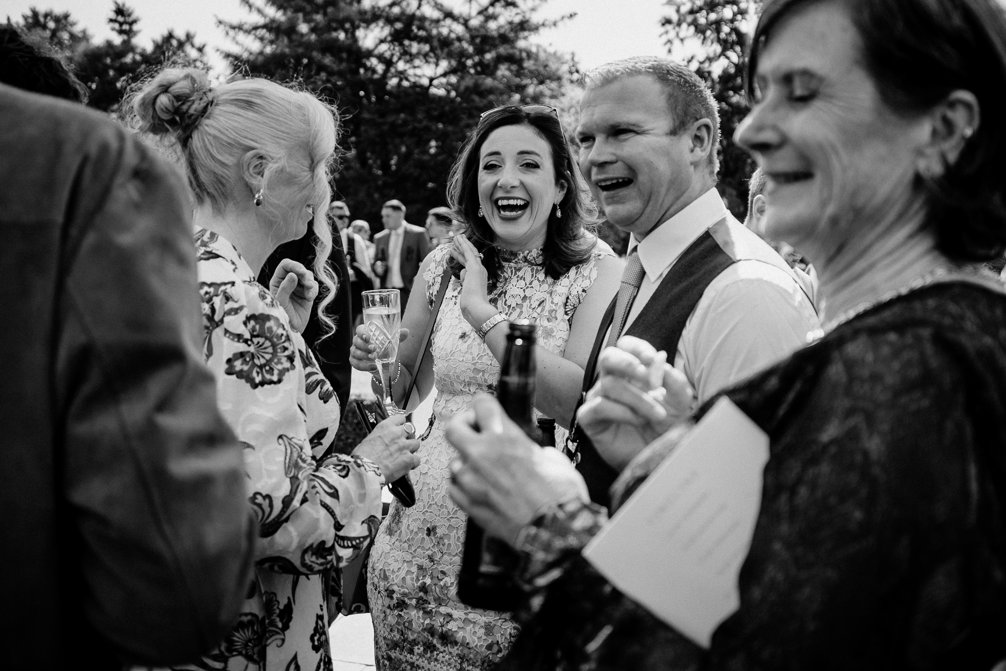 Wedding guests laughing during a candid reception moment at Markree Castle