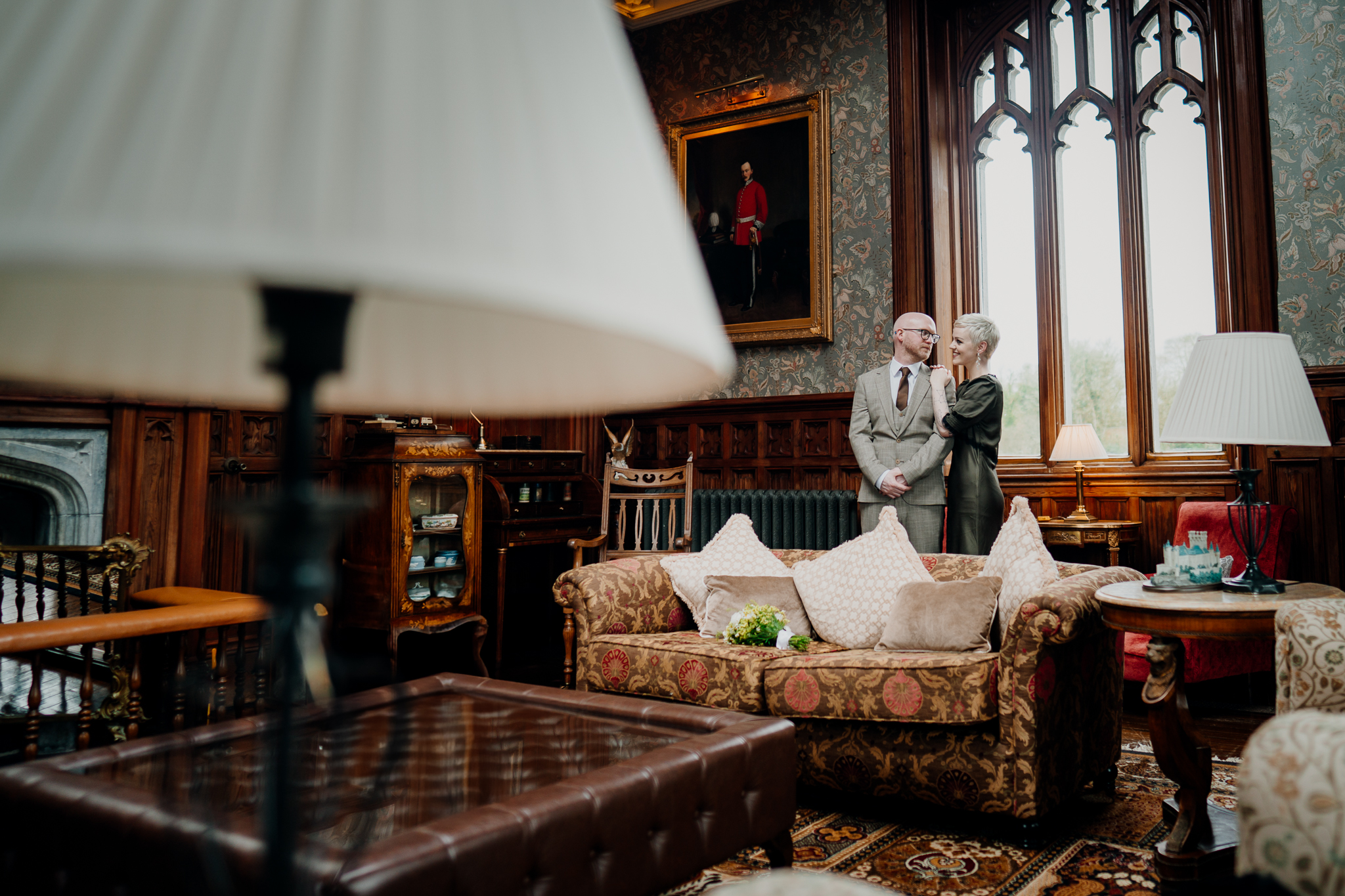 Historic Billiard Room at Markree Castle with newlyweds beside the window