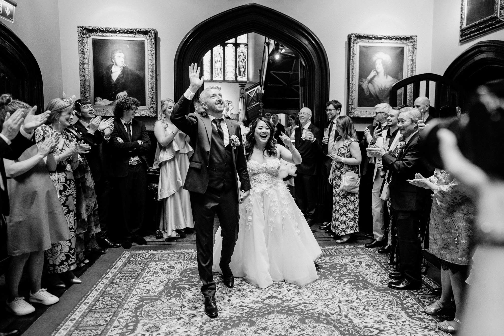 Bride and groom entering their wedding reception at Markree Castle