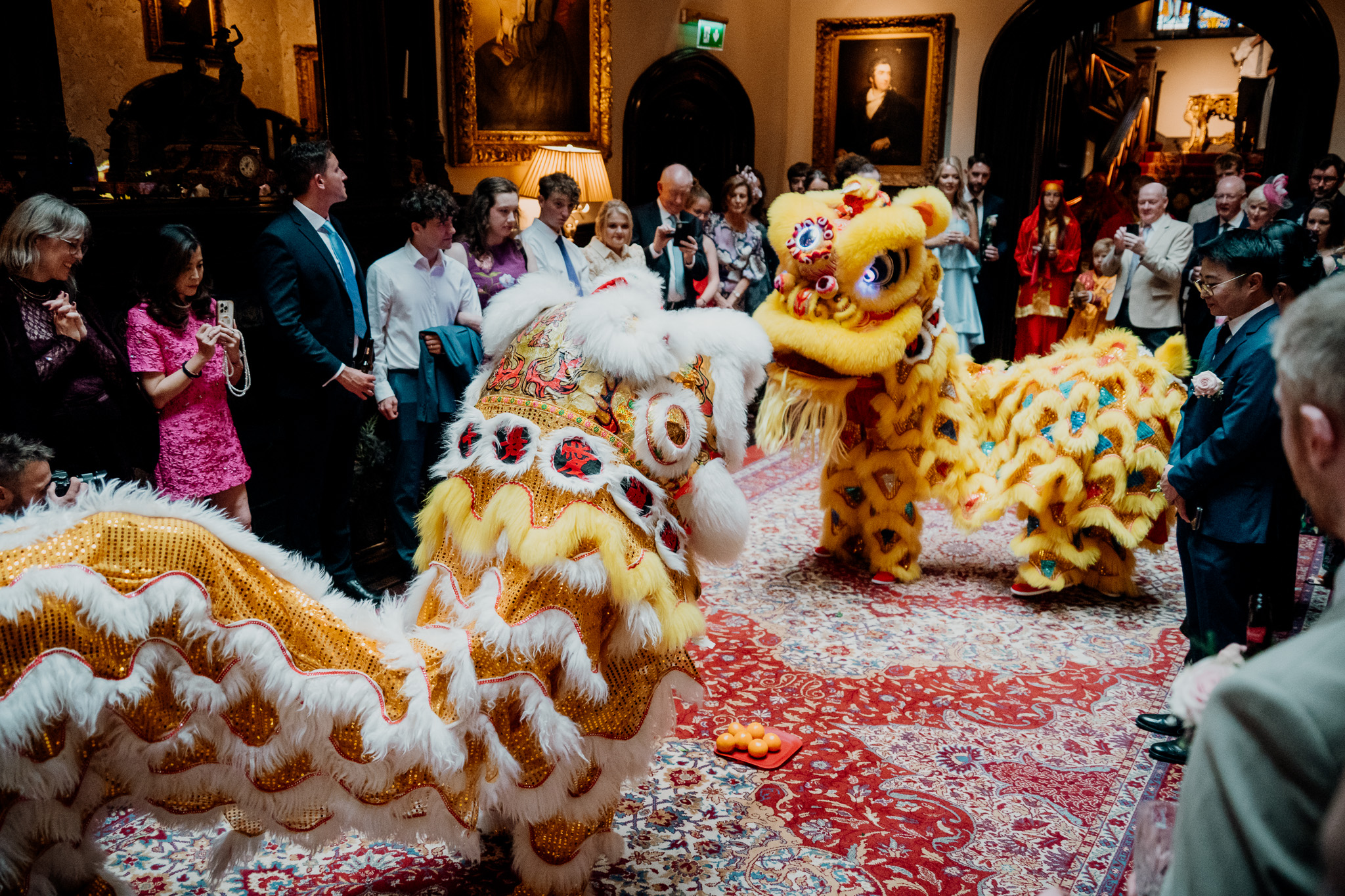 Chinese lion dance performance at Markree Castle wedding reception