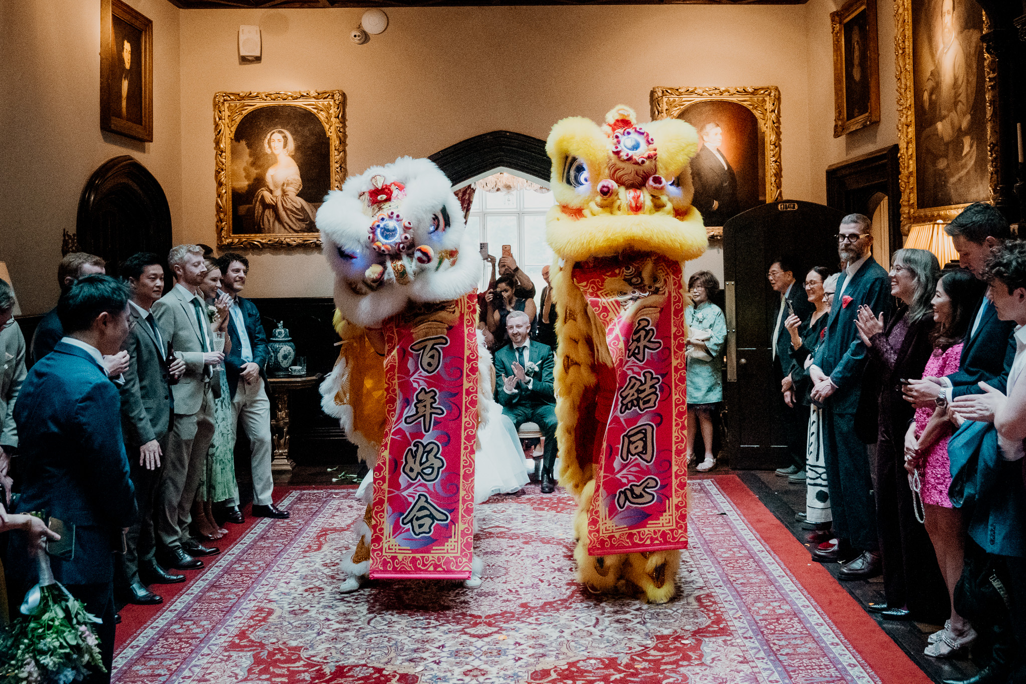 Chinese lion dance performers at a Markree Castle wedding