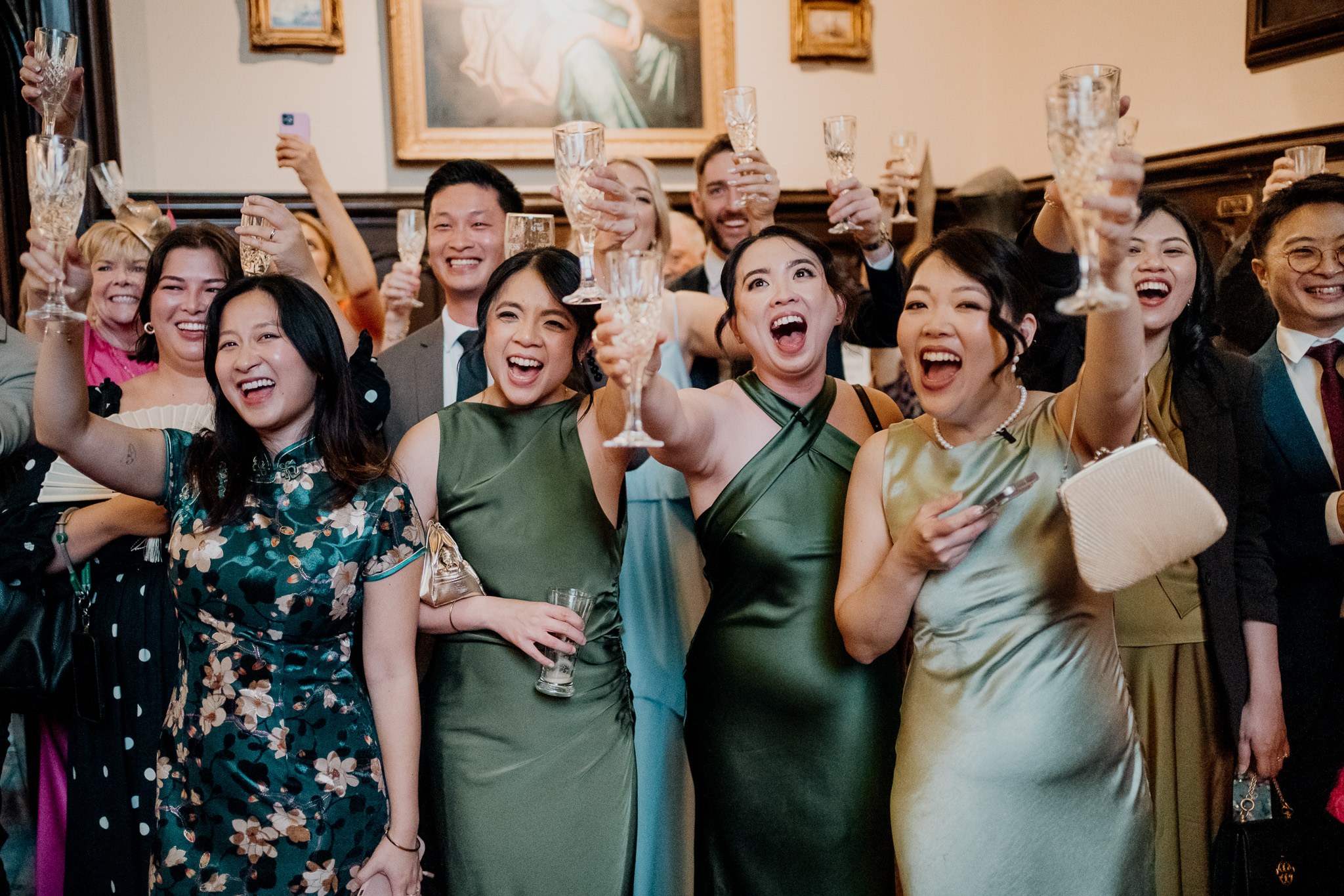 Wedding guests cheering during speeches at Markree Castle