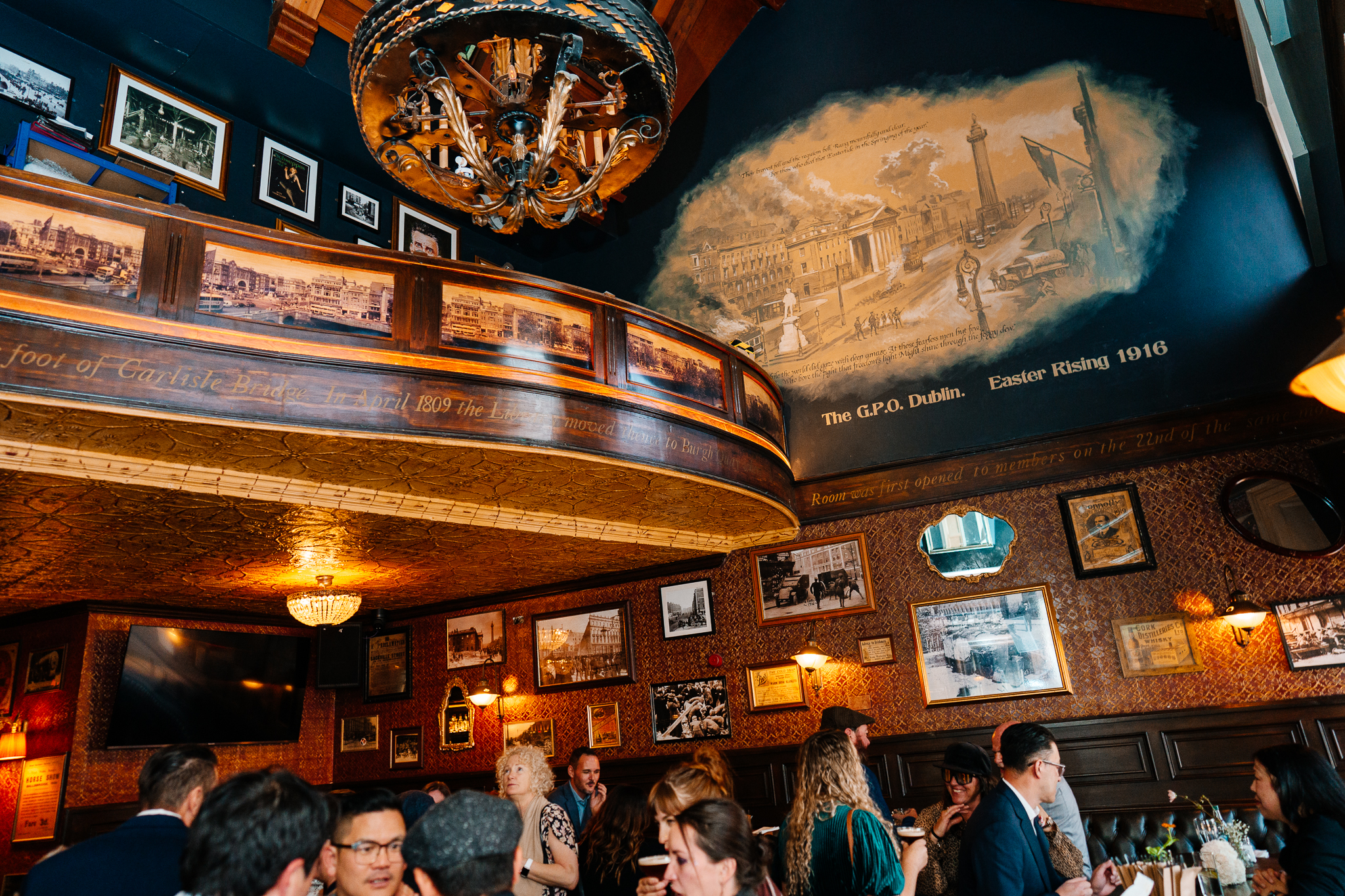 Traditional wooden interior and decorative details of J.R. Mahon's pub during a Dublin wedding reception