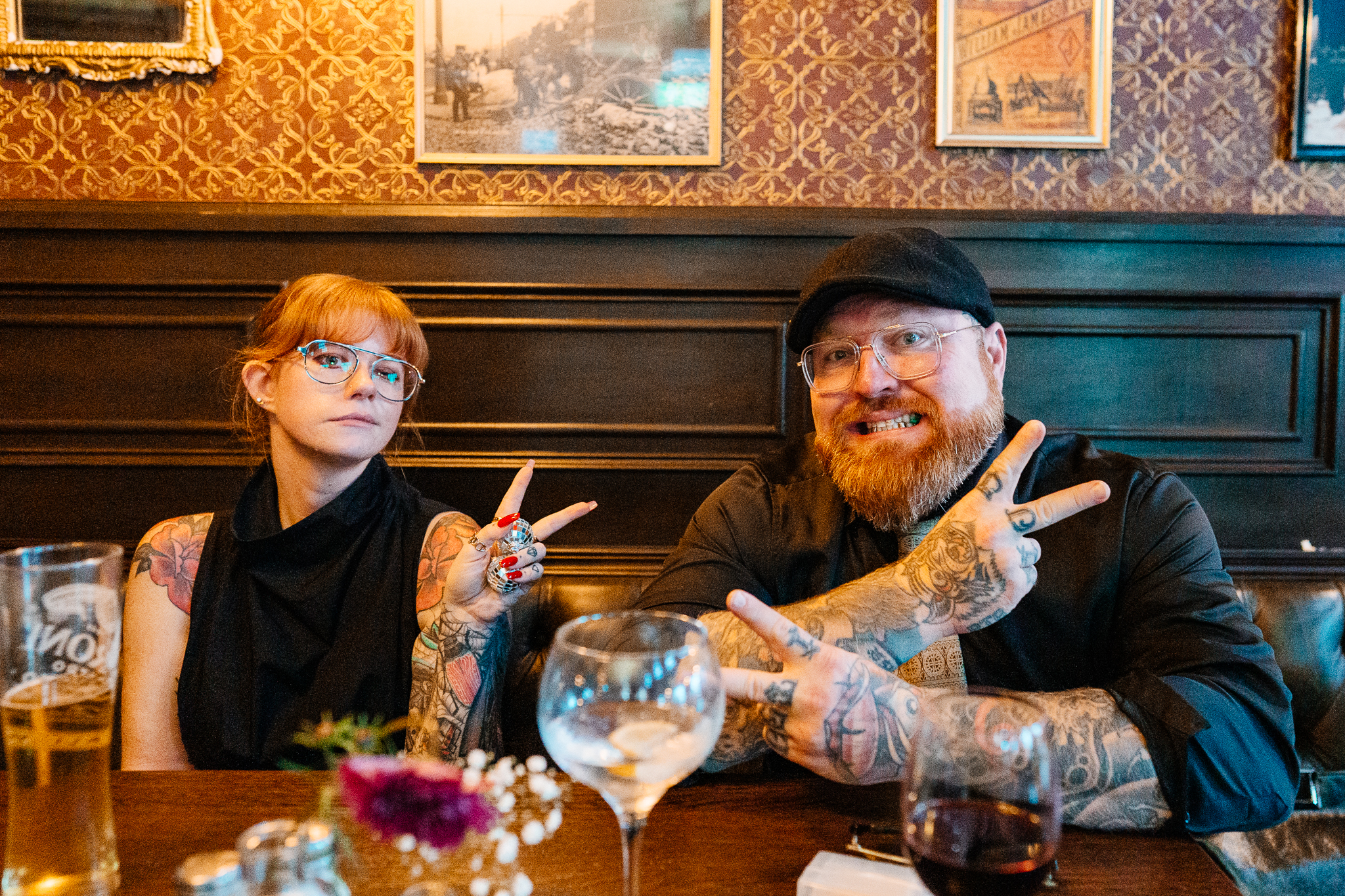Two wedding guests seated together during an evening reception at J.R. Mahon's in Dublin
