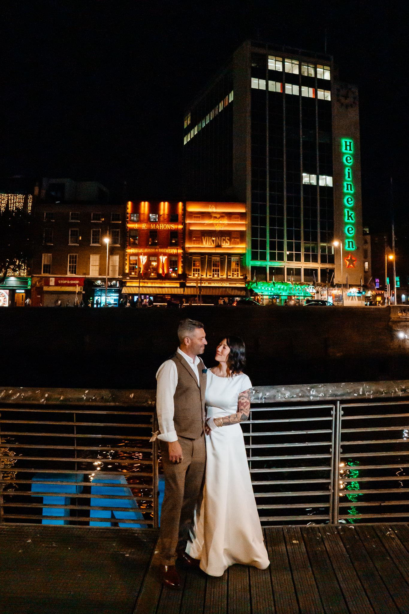 Illuminated buildings and city lights in Dublin photographed after dark during a wedding celebration