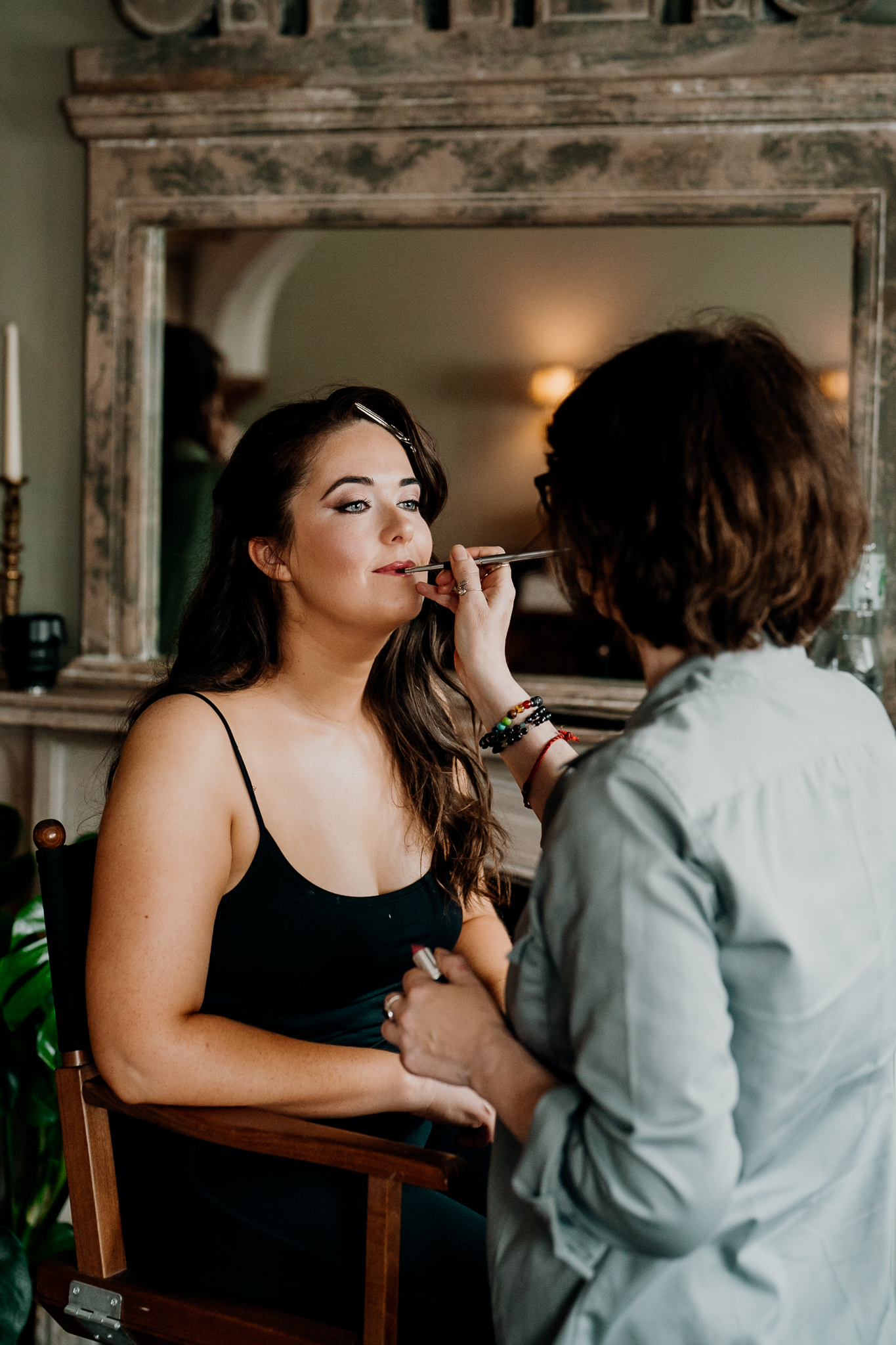 Bride having her makeup applied during morning wedding preparations at Markree Castle in Sligo.