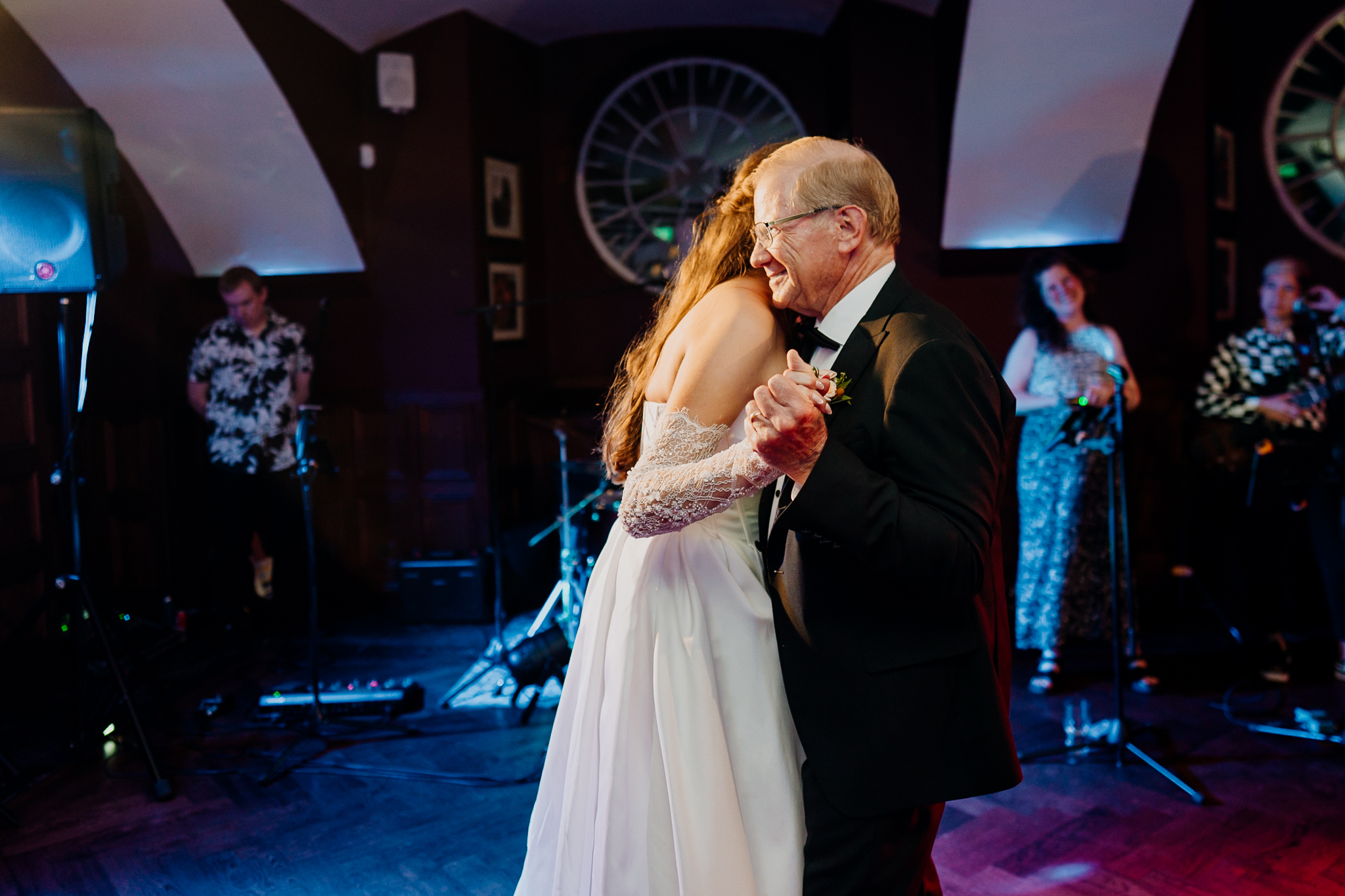 Bride and groom kissing while dancing together on the indoor wedding dance floor at Markree Castle.
