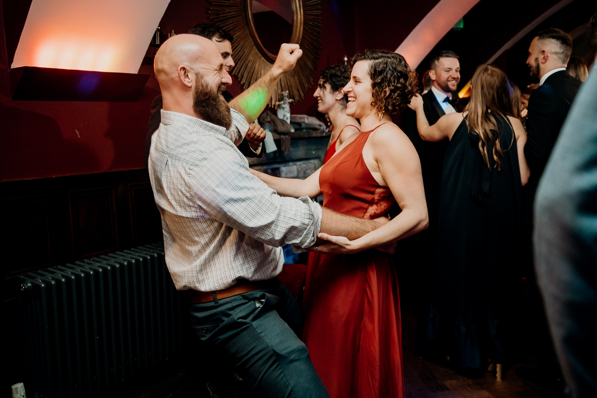 Wedding guests dancing together on the crowded evening dance floor at Markree Castle, Sligo.