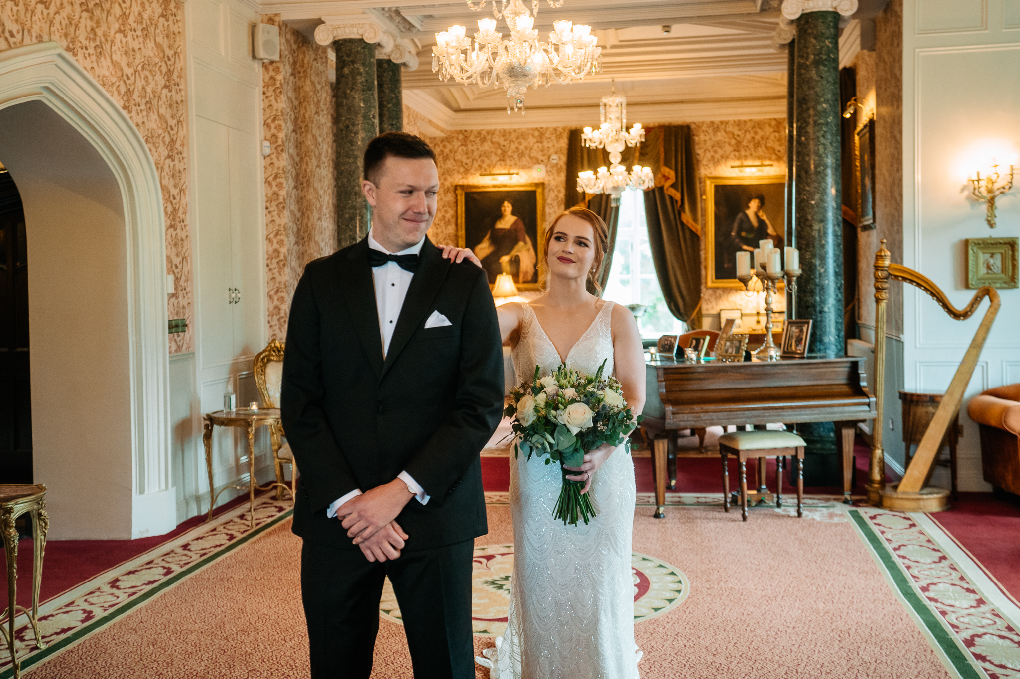 Bride and groom together after their first look in Markree Castle Grand Hall