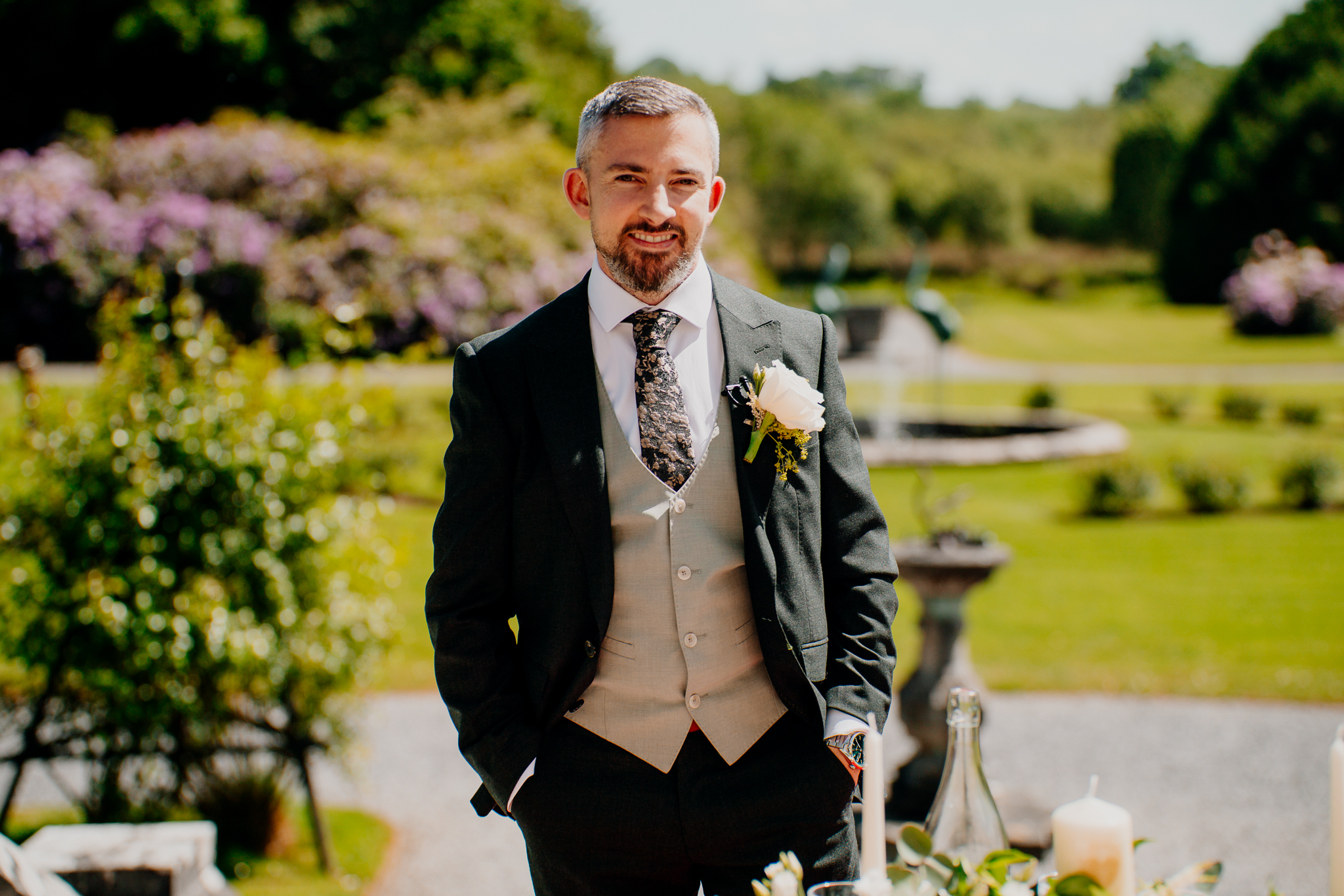 Groom waiting for his bride before their outdoor garden wedding ceremony at Markree Castle in Sligo.
