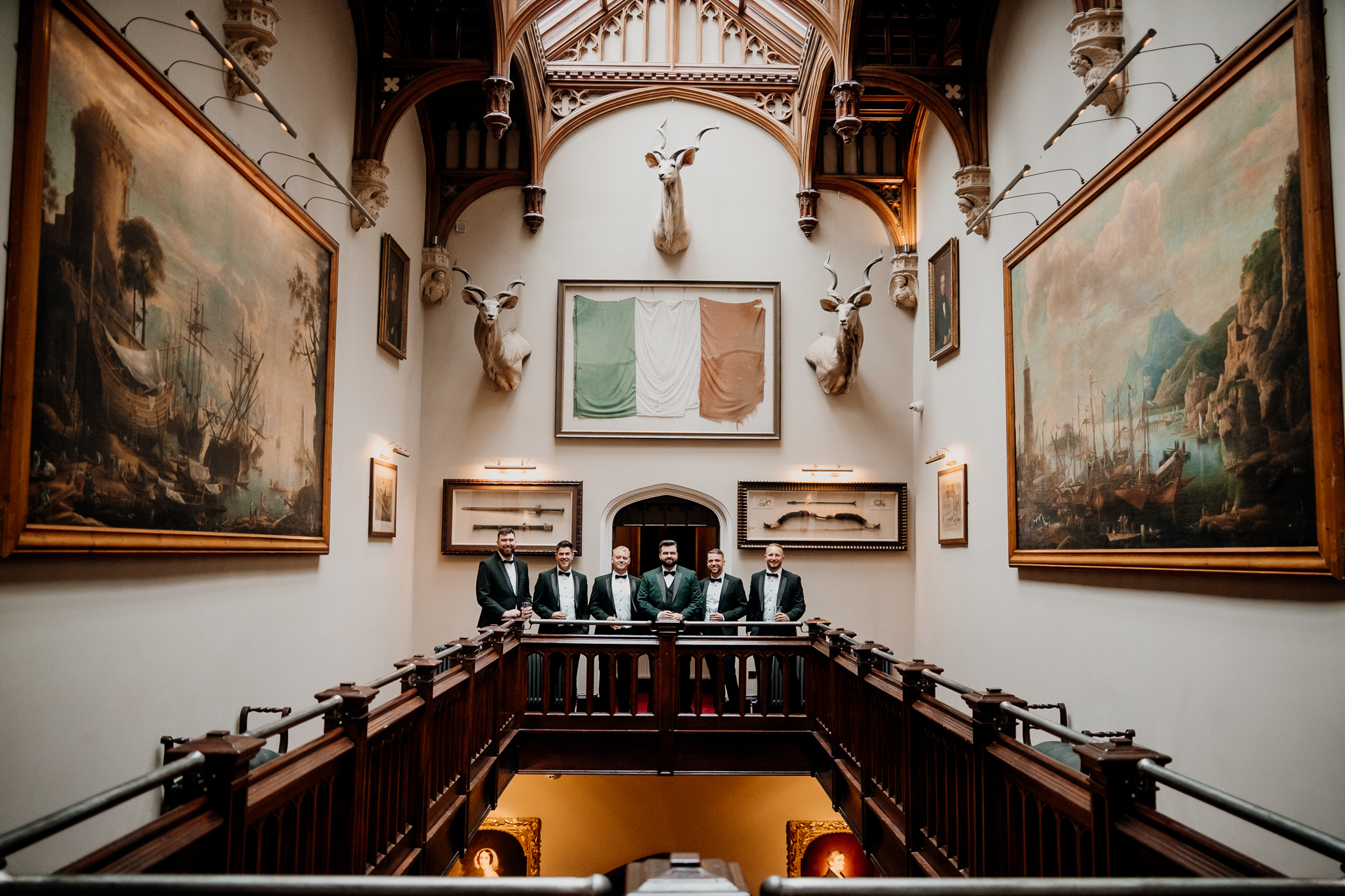 Interior of the wedding chapel at Markree Castle, with wooden pews, arched ceiling and decorative altar.