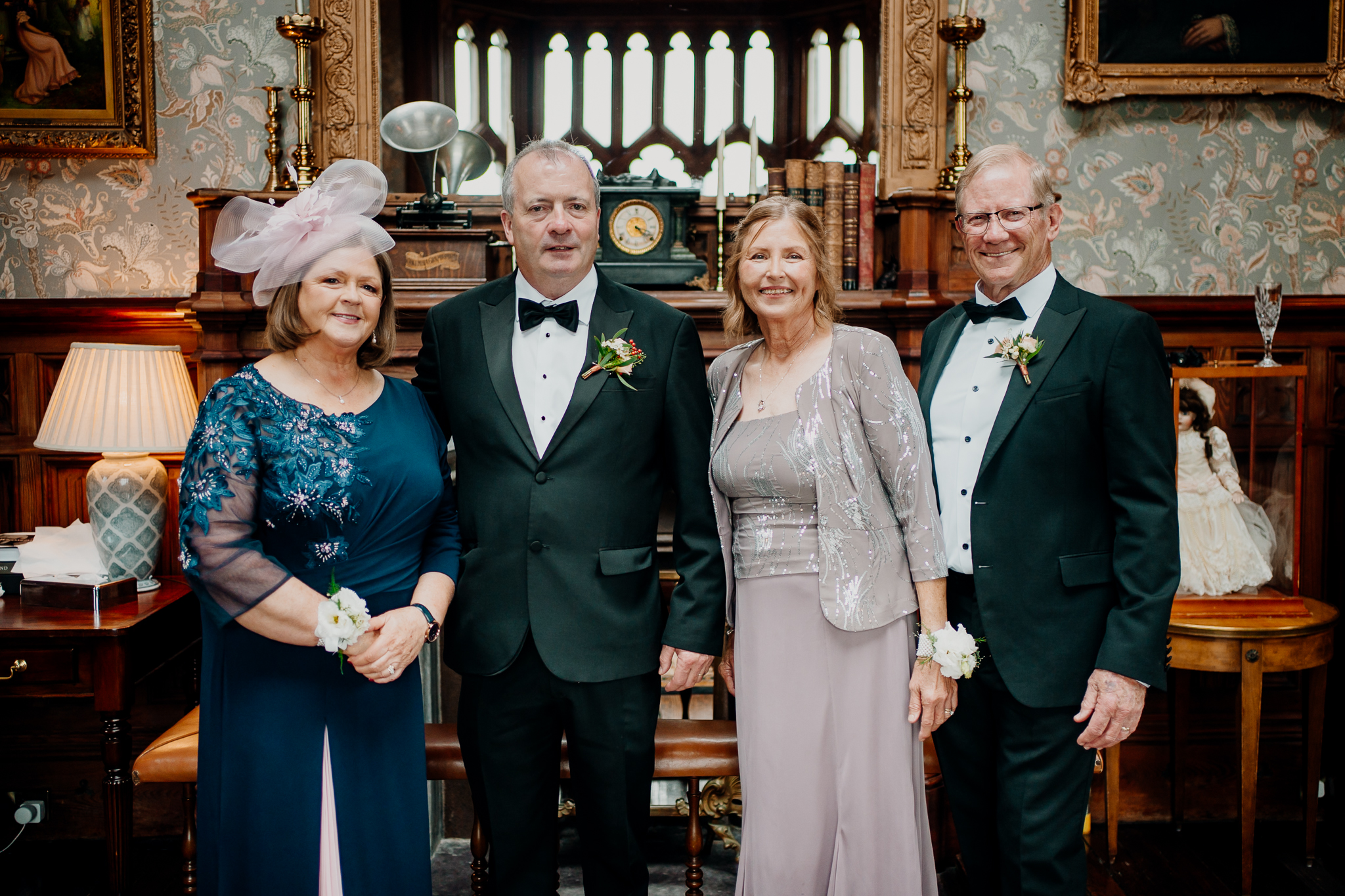 Family members posing together for a wedding portrait inside the historic Billiard Room at Markree Castle.