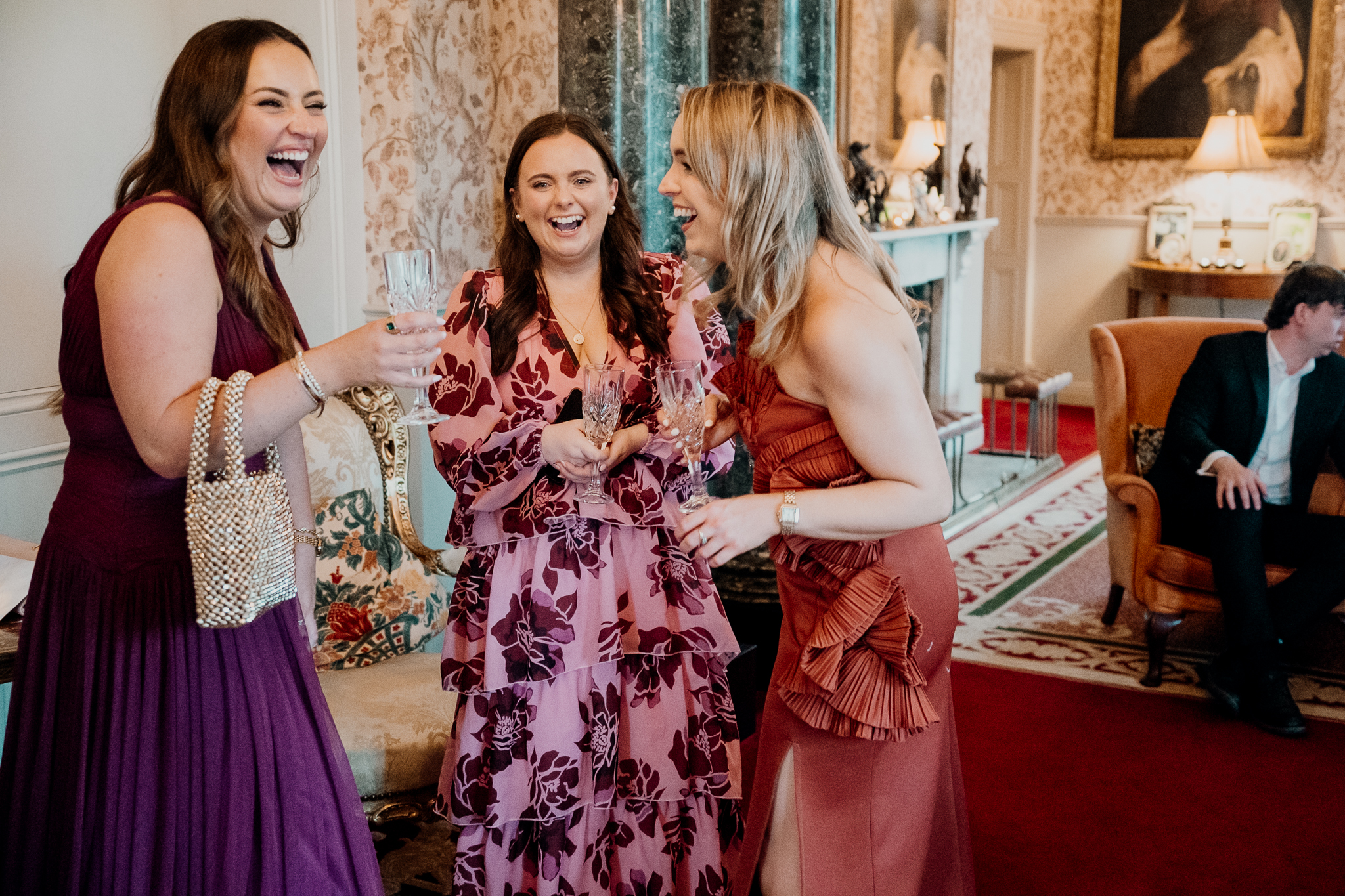 Candid moment between wedding guests during a Markree Castle reception