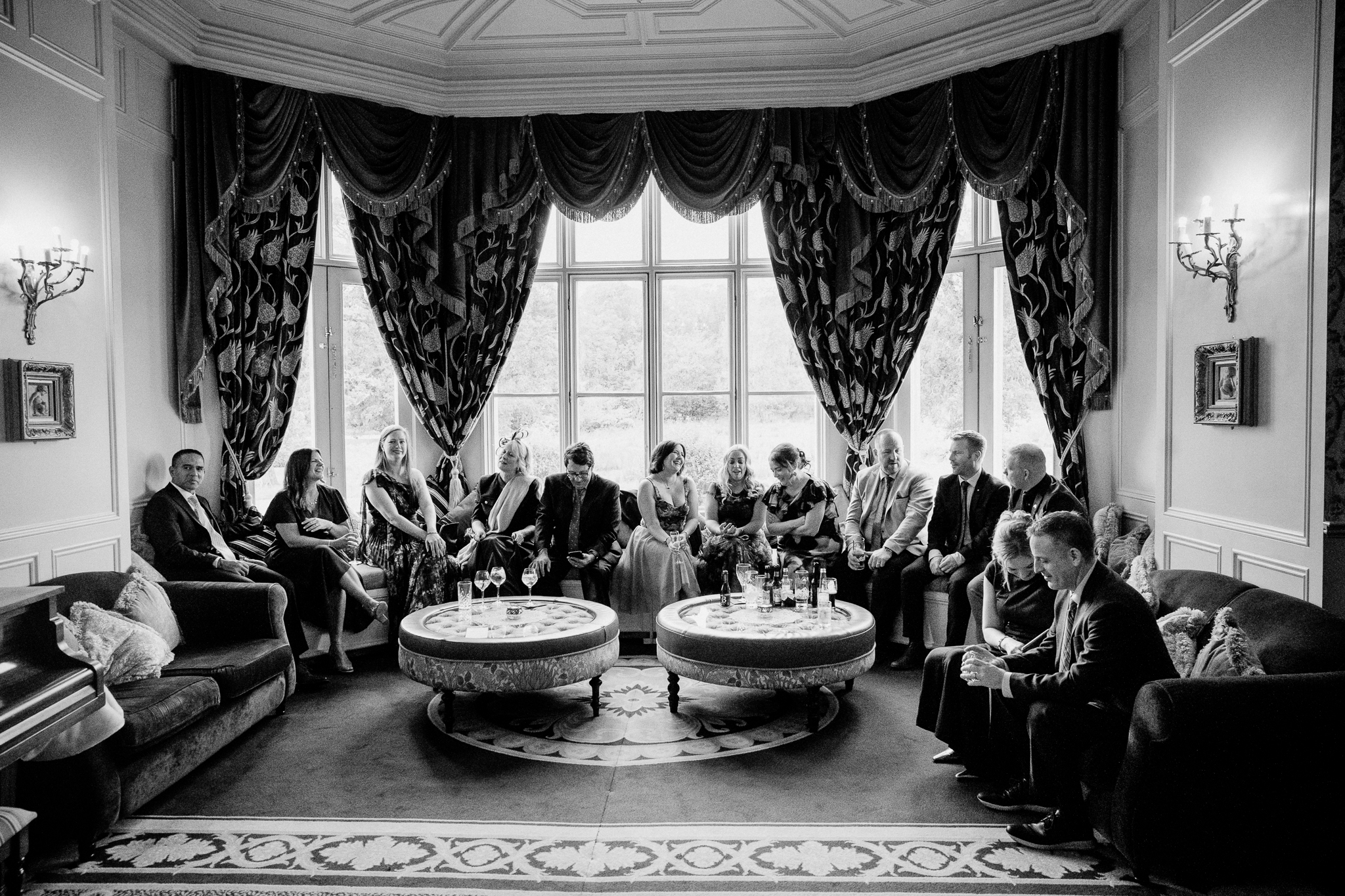 Wedding guests laughing together during a Markree Castle reception