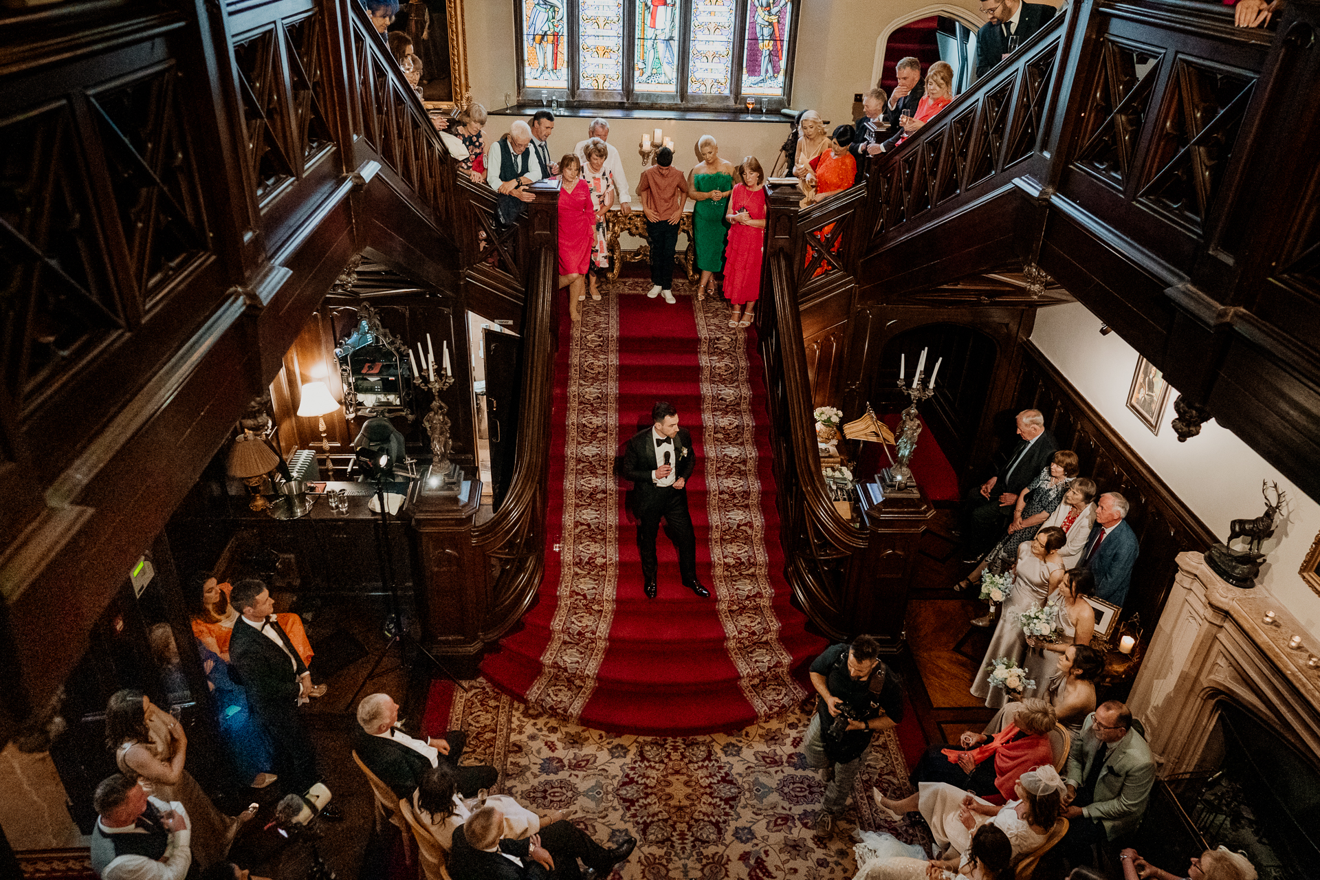 Wedding speech on the main staircase at Markree Castle photographed from above