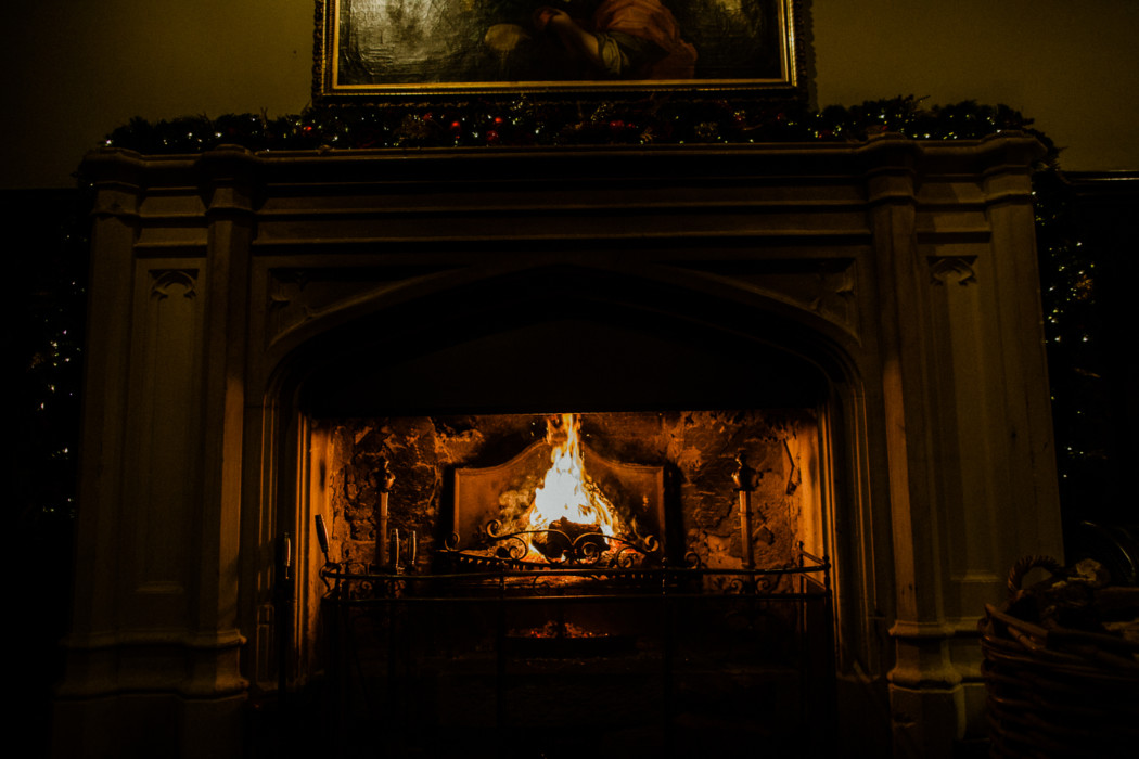 A fire place sitting in a dark room