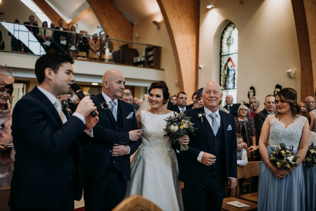 A group of people standing in a room