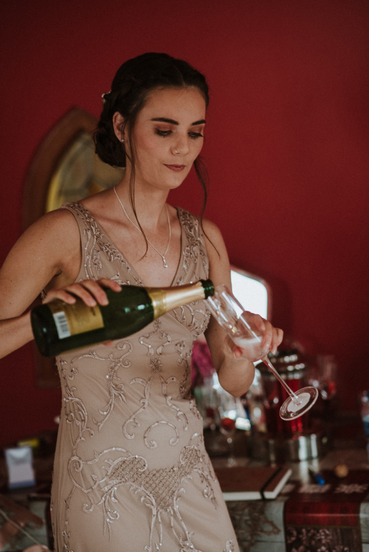 A woman holding a wine glass
